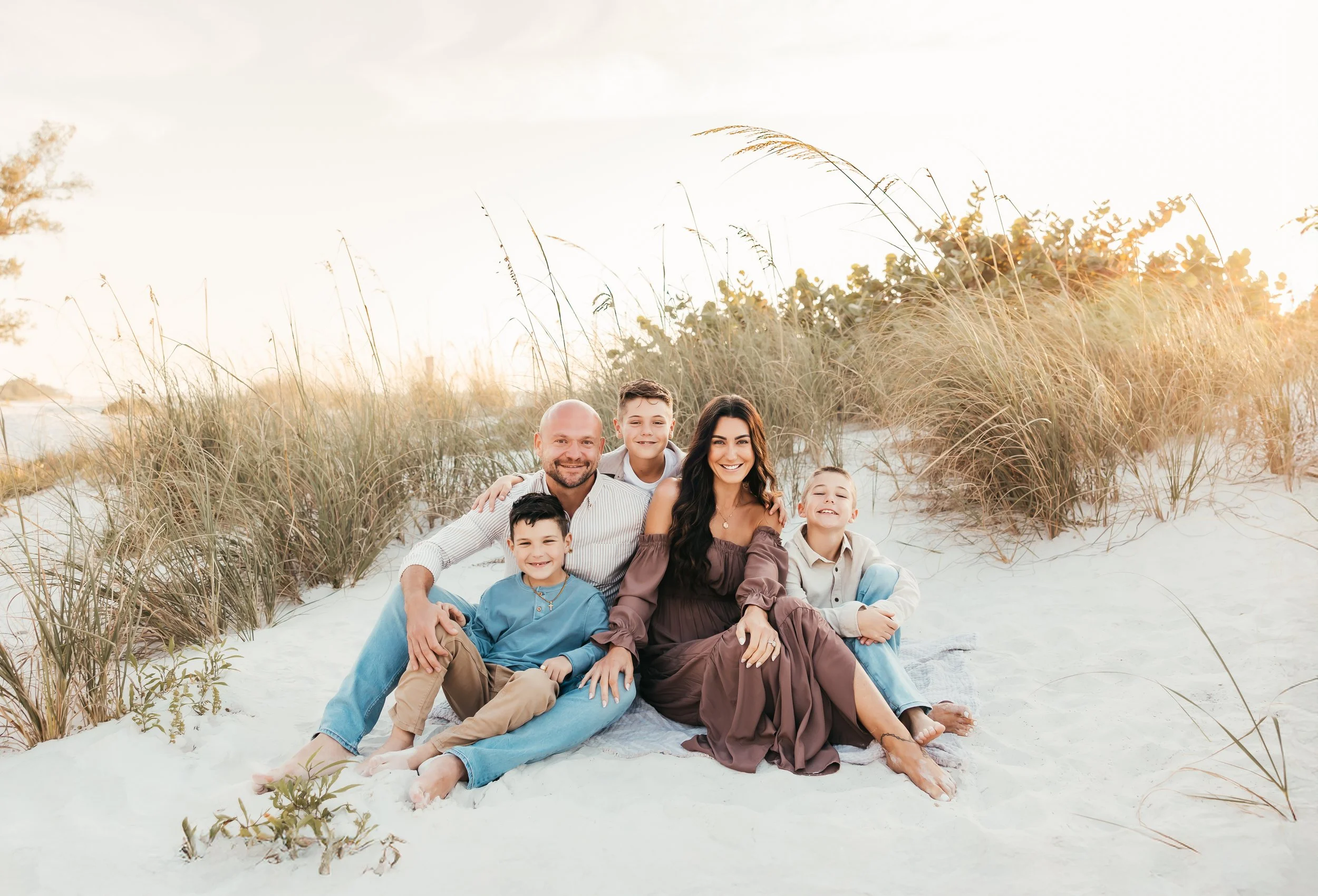 happy family on a beach; south peak pools fl
