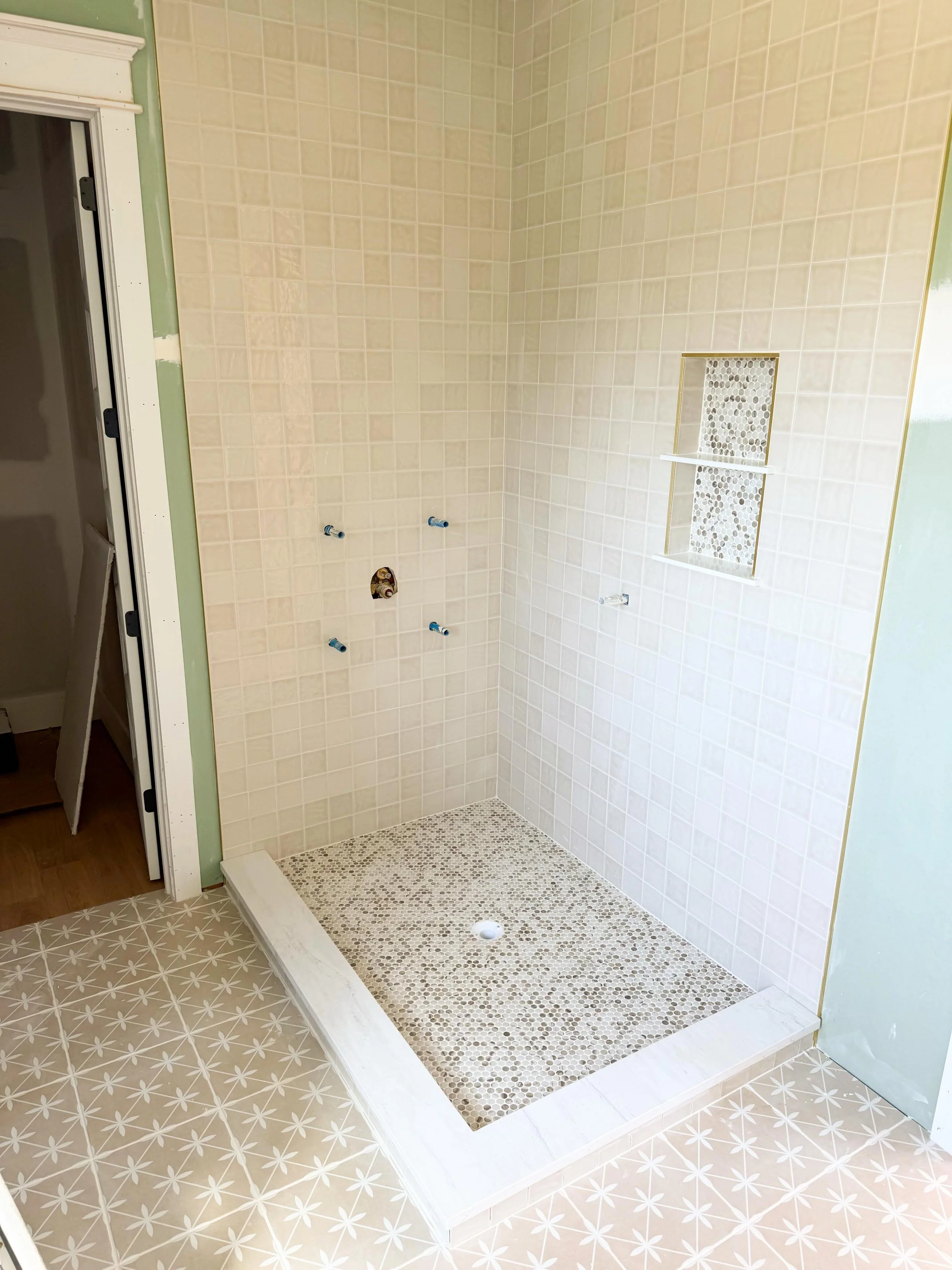 Ready for paint, plumbing fixtures &amp; shower doors in this neutral master bath retreat! We love how this tile combo turned out ✨🚿🛁