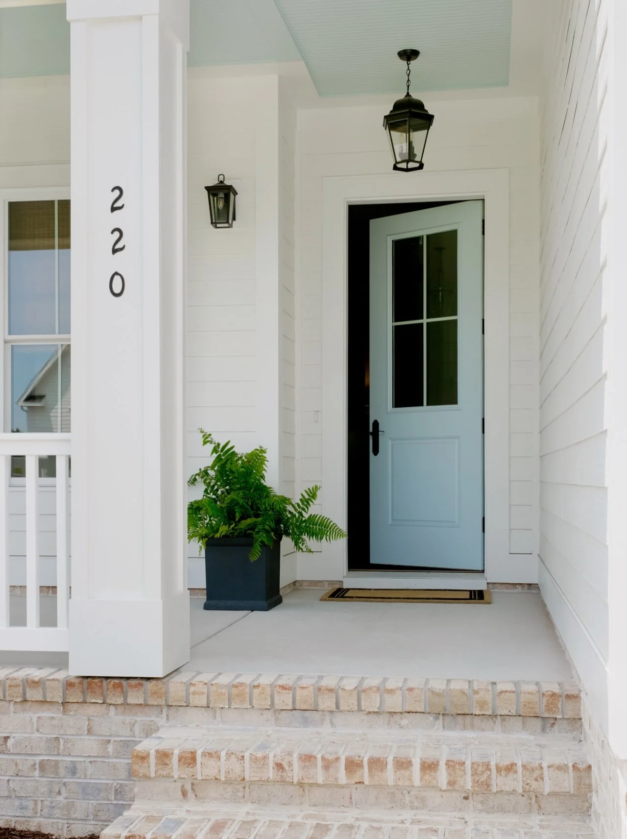 A warm &amp; furry welcome ☀️🐶 

Exterior White: SW Alabaster
Interjor White: SW Pure White 
Porch Ceiling &amp; Door: SW Little Boy Blu 

#sherwinwilliamspaint #curbappealgoals #southernporches #whitepaint #whitepaintcolors