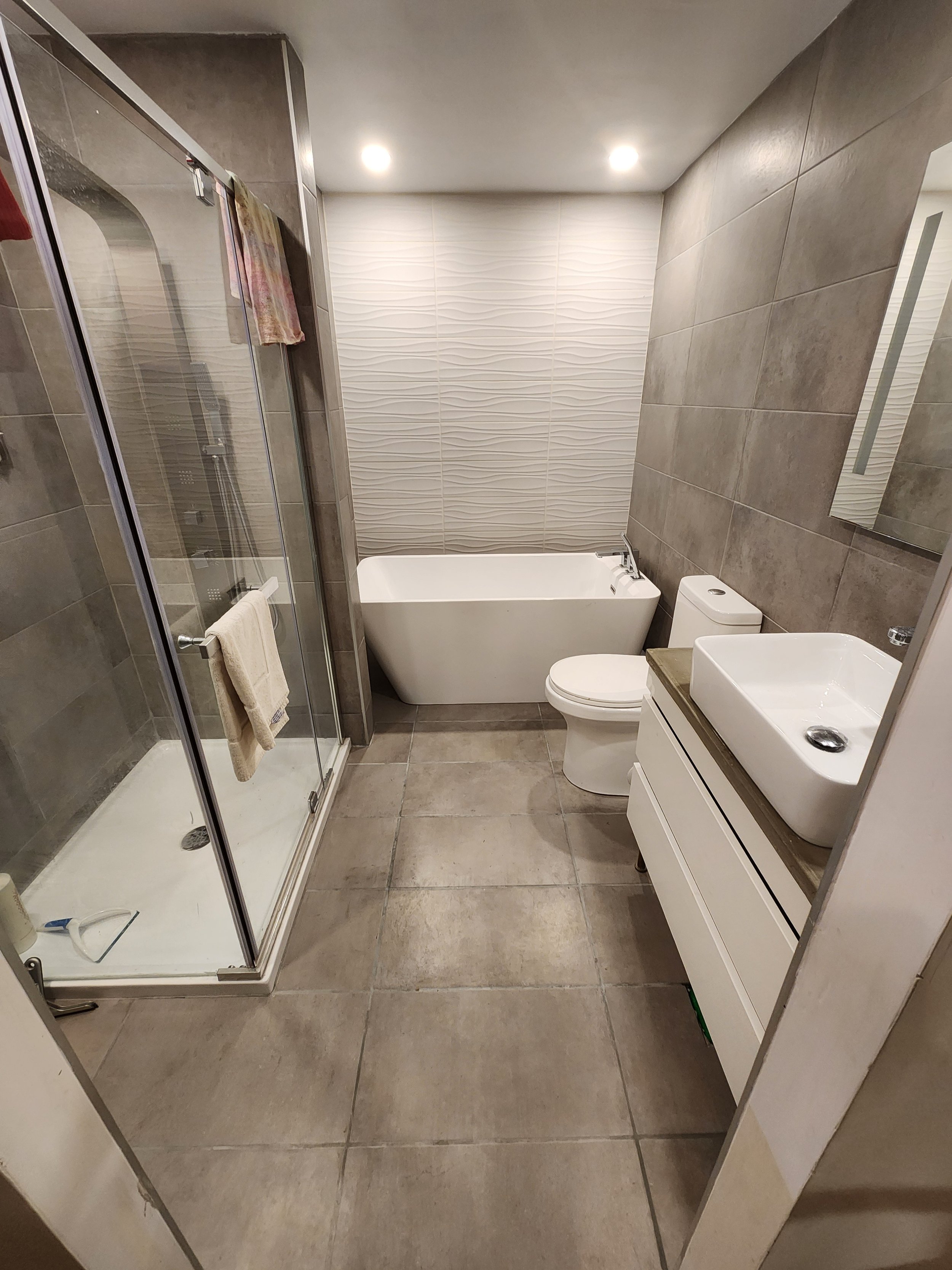 Modern bathroom with a glass-enclosed shower