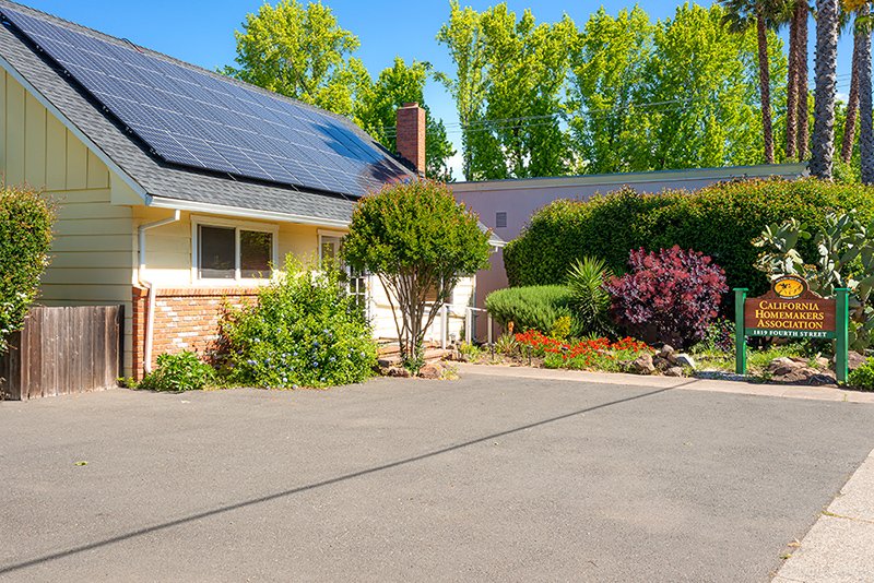 The front of CHA's office showing new front sign and solar panels.