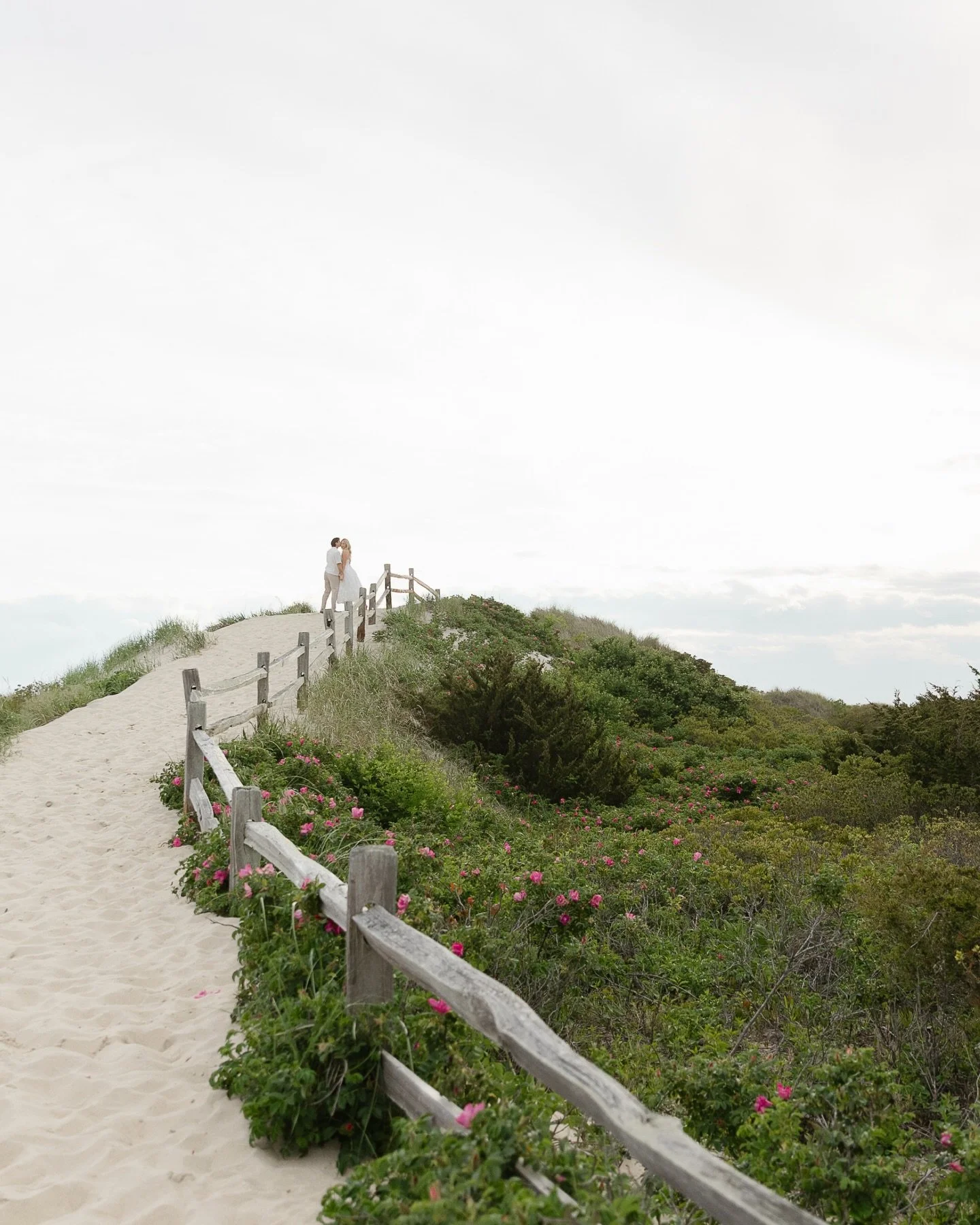 Somehow managed to get an evening of ideal weather and a nearly empty beach for Candace + Michael&rsquo;s engagement session in Watch Hill!