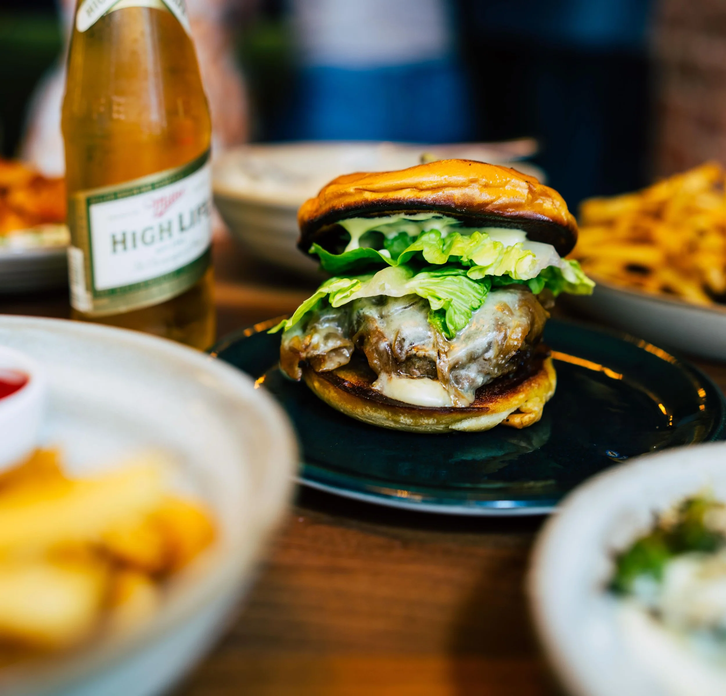 Our Gorgonzola Burger is on our Memorial Day lunch specials 12-4! $13 food specials or add a cocktail, beer, or wine for $20 😎 

PLUS happy hour till 7!