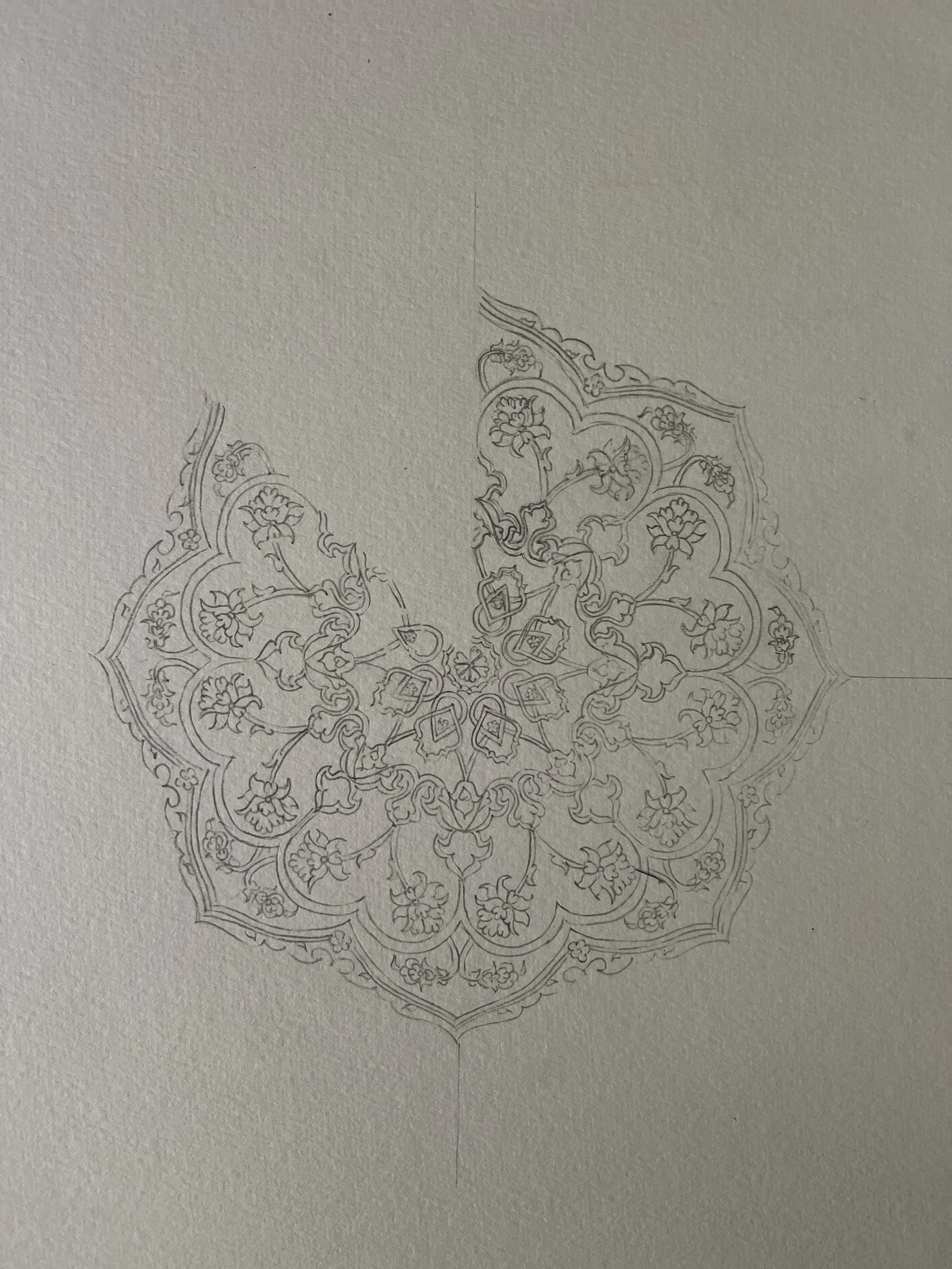 Hand-drawn intricate mandala pattern with floral and geometric designs on paper
