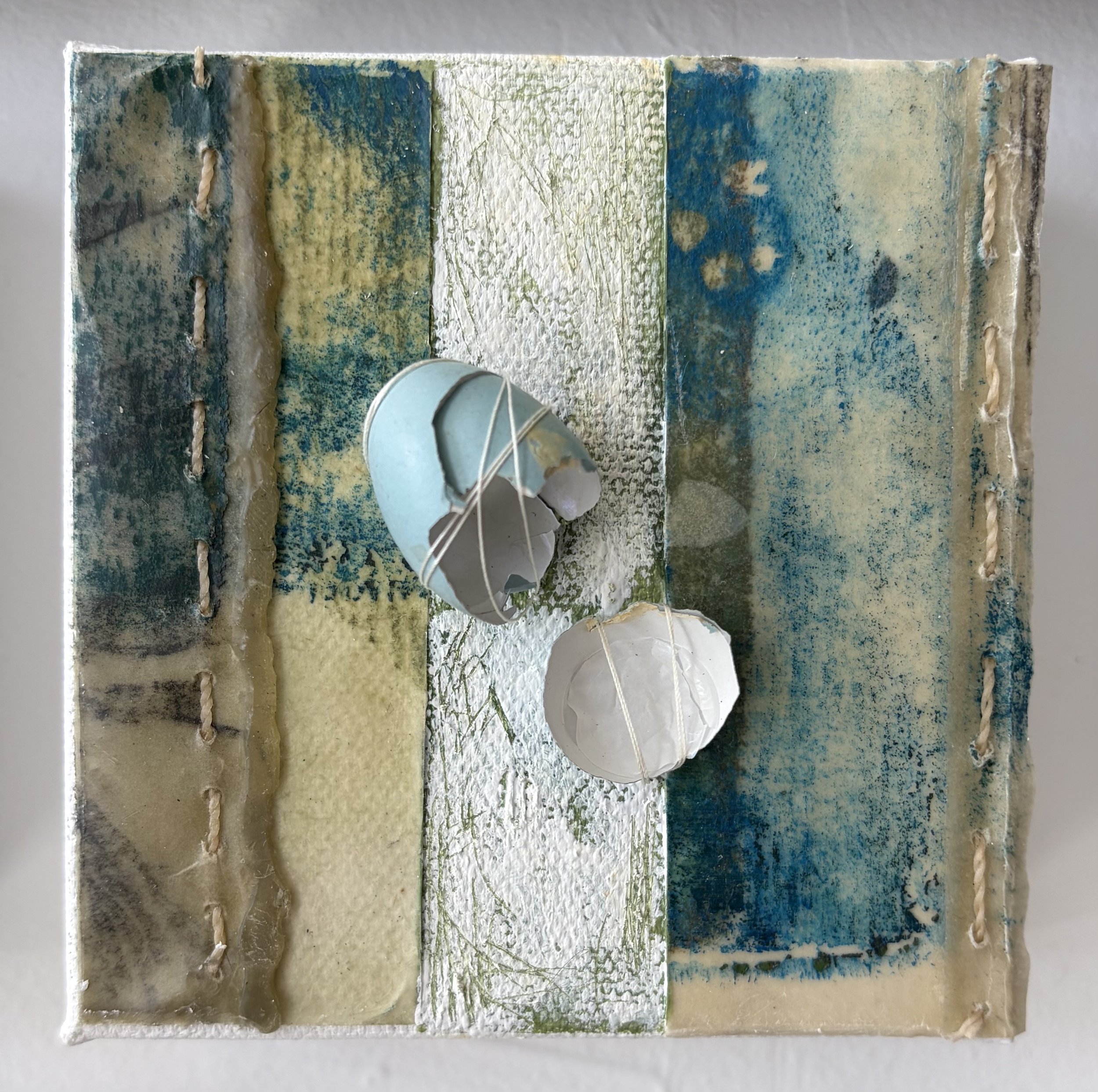 Eggshells, 2026
mixed media, monoprinting, beeswax, stitching, found objects, acrylic
4" x 4"
$100