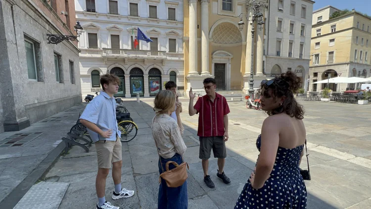 Our group talking in an Italian piazza