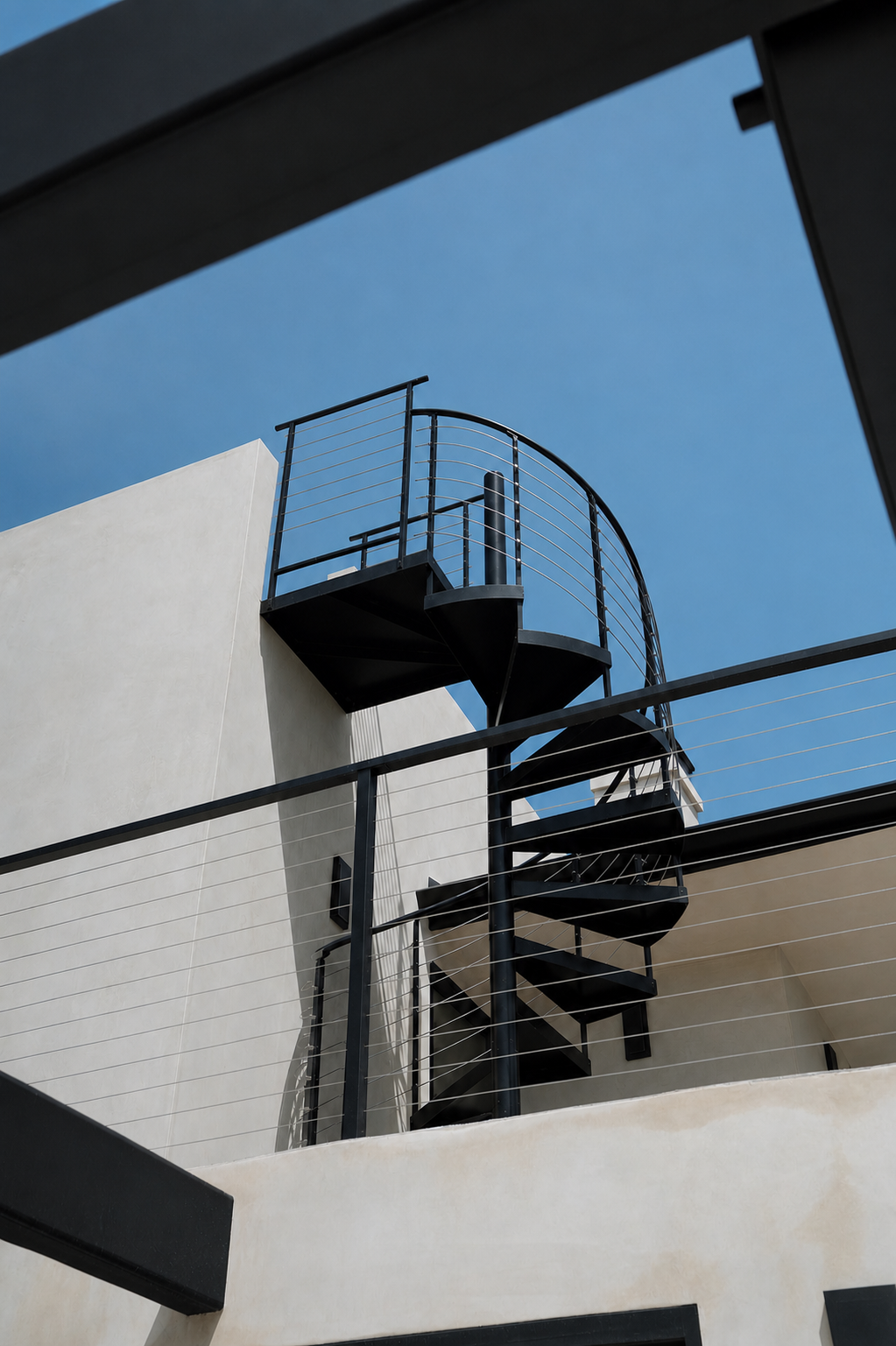 Spiral stair to rooftop deck
