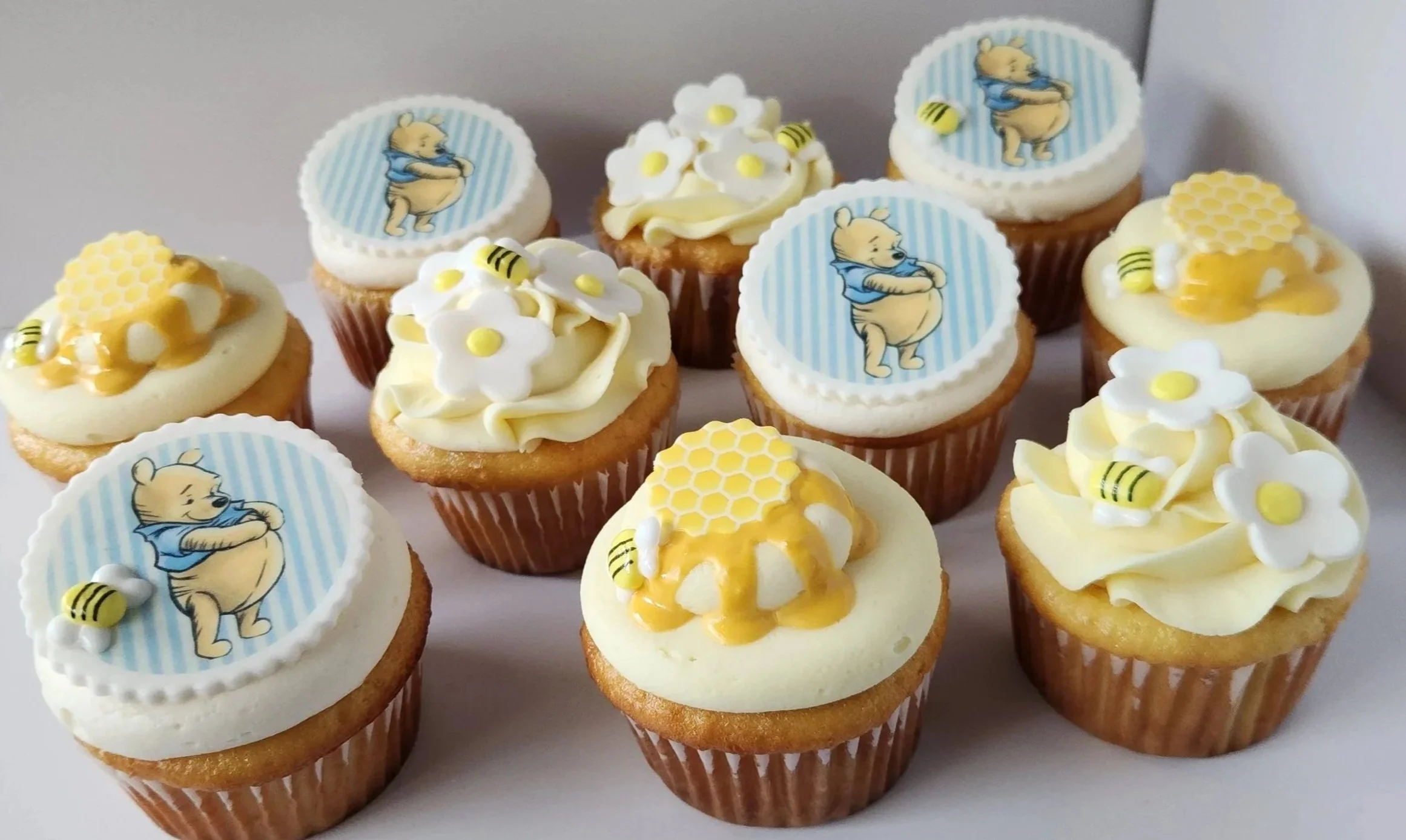 Cupcakes with cow face illustrations and a message that reads, 'I will love you until the cows come home'.