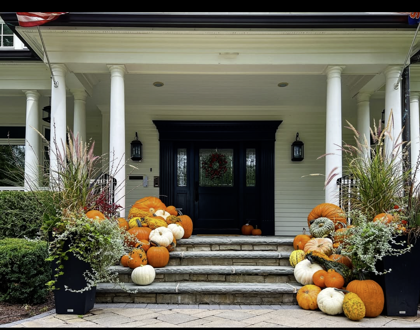“Front porch decorated with orange and white pumpkins on steps in Courtenay BC by Patch to Porch”