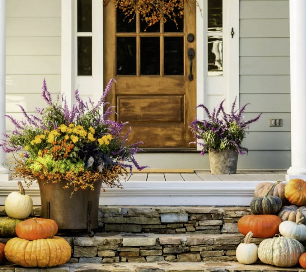 “Fall porch decorating with bright flowers and pumpkins by Patch to Porch in Courtenay”