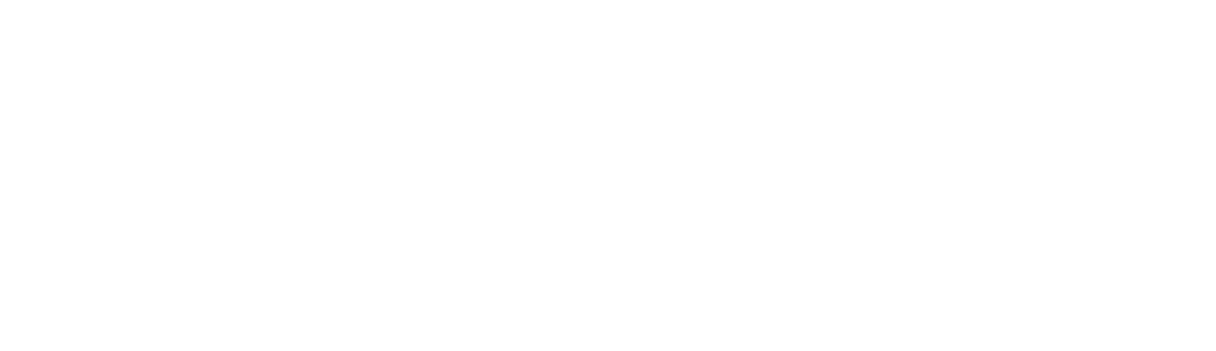 Close-up of a sign that says 'ELEVATOR' in black and white.