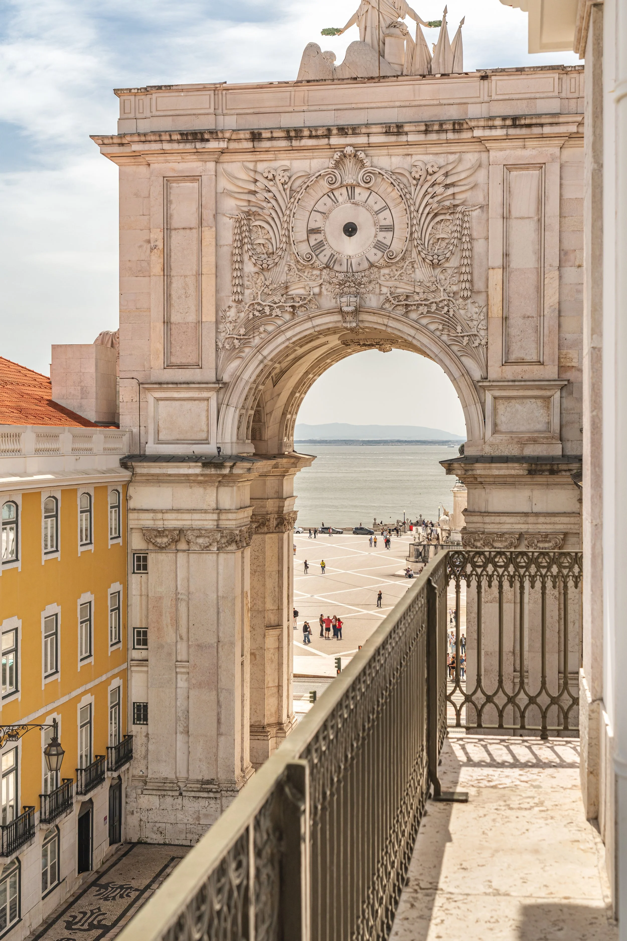 View from the Andaz Arch Suite, overlooking the main city commerce square Praça do Comércio, getaway to the Tagus River and entrance of Lisbon city.
