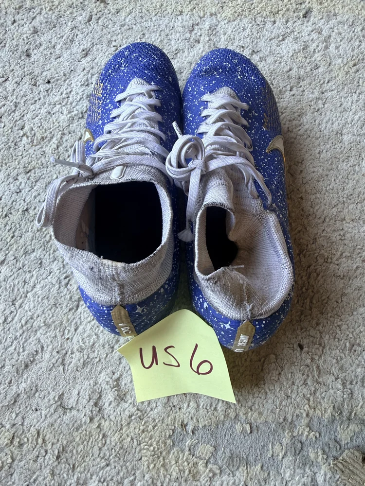 Nike blue/white star cleats, US 6