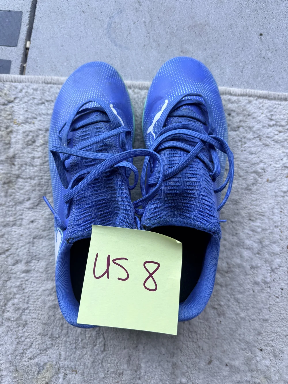 Puma blue knit cleats, US 8
