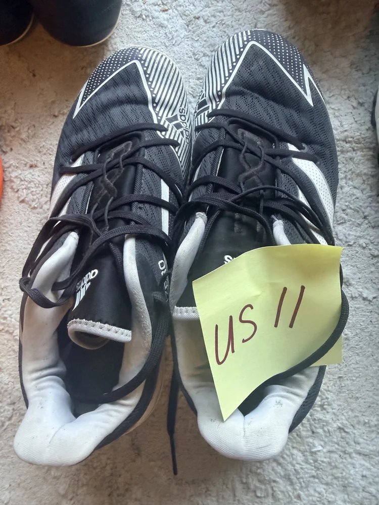 Adidas black/white cleats, US 11