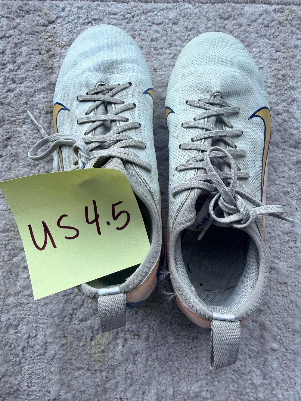 Nike white/gold cleats, US 4.5