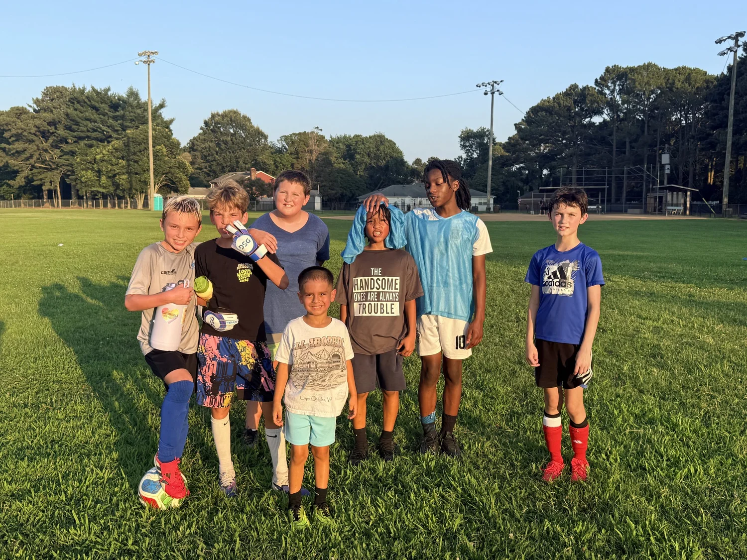 Kids playing pickup soccer at the Alanton Pitch