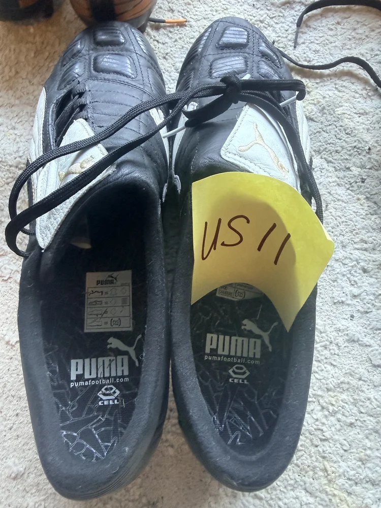 Puma King black leather cleats, US 11