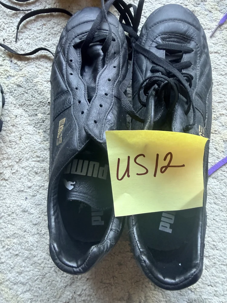 Puma King black leather cleats, US 12