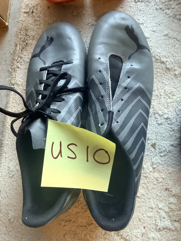 Puma gray cleats, US 10