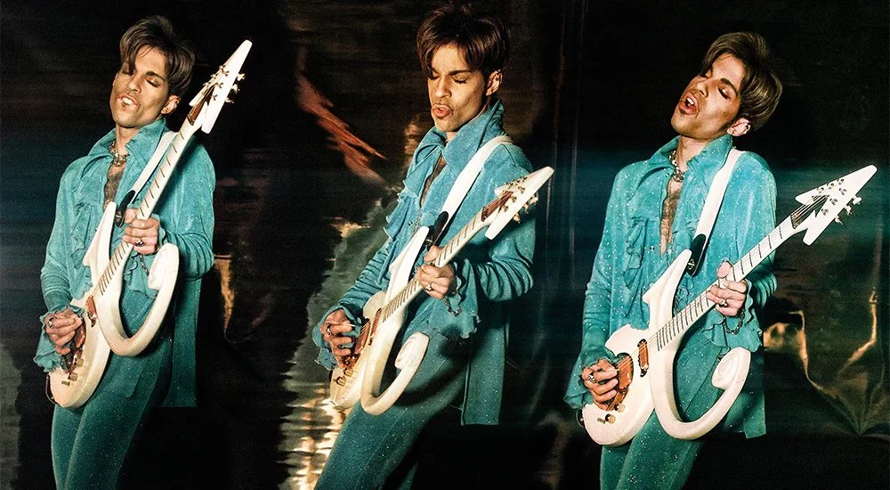 Prince Playing his Auerswald symbol guitar