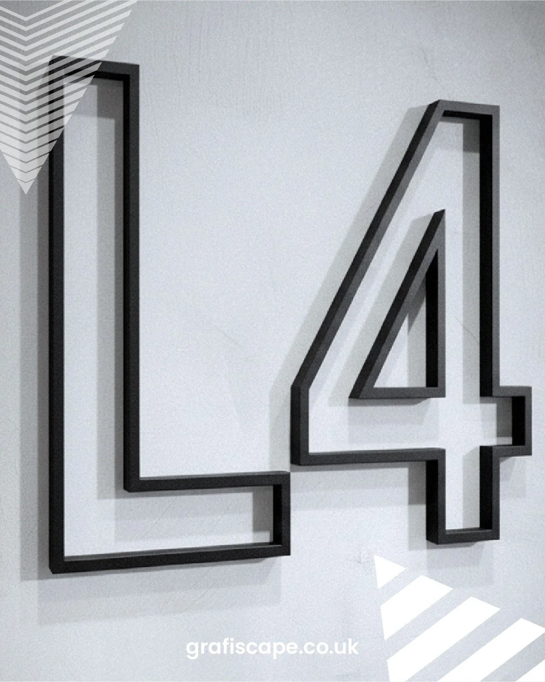 3D wall lettering designed to add presence without excess. With depth, spacing, and shadow carefully controlled, the typography feels grounded in the architecture rather than applied on top of it.

Browse our product range: https://www.grafiscape.co.