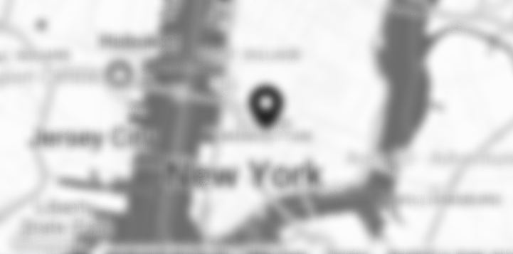 a blurred Map showing a location in New York City.