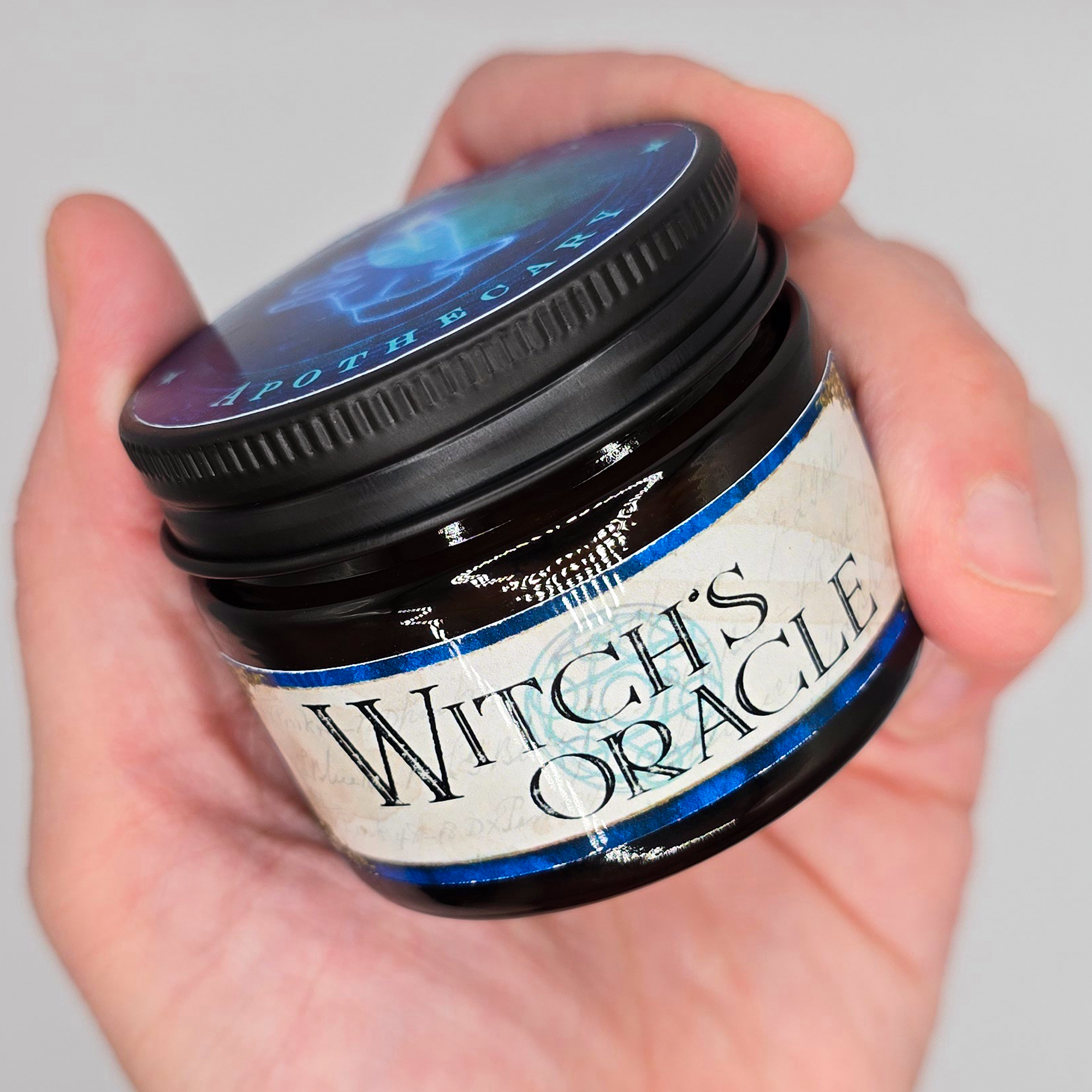 Lotion_WitchOra_Title_Hand.png