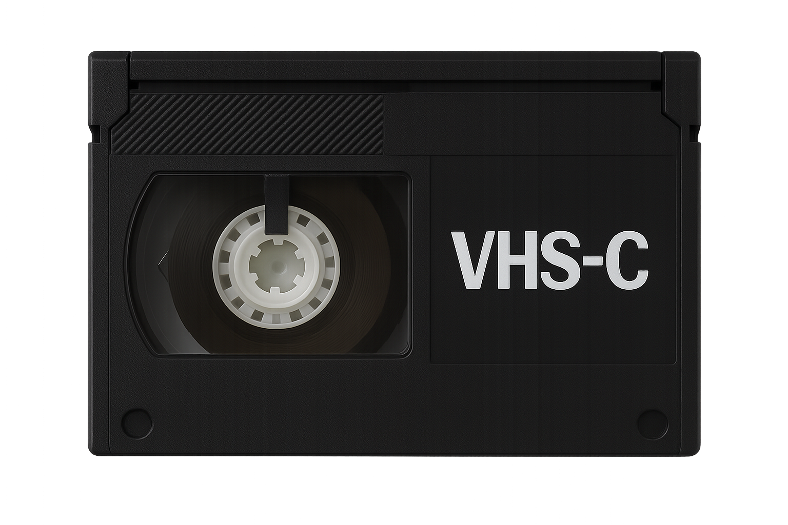 Close-up of a black VHS-C tape with a visible reel and the label 'VHS-C' on the side.
