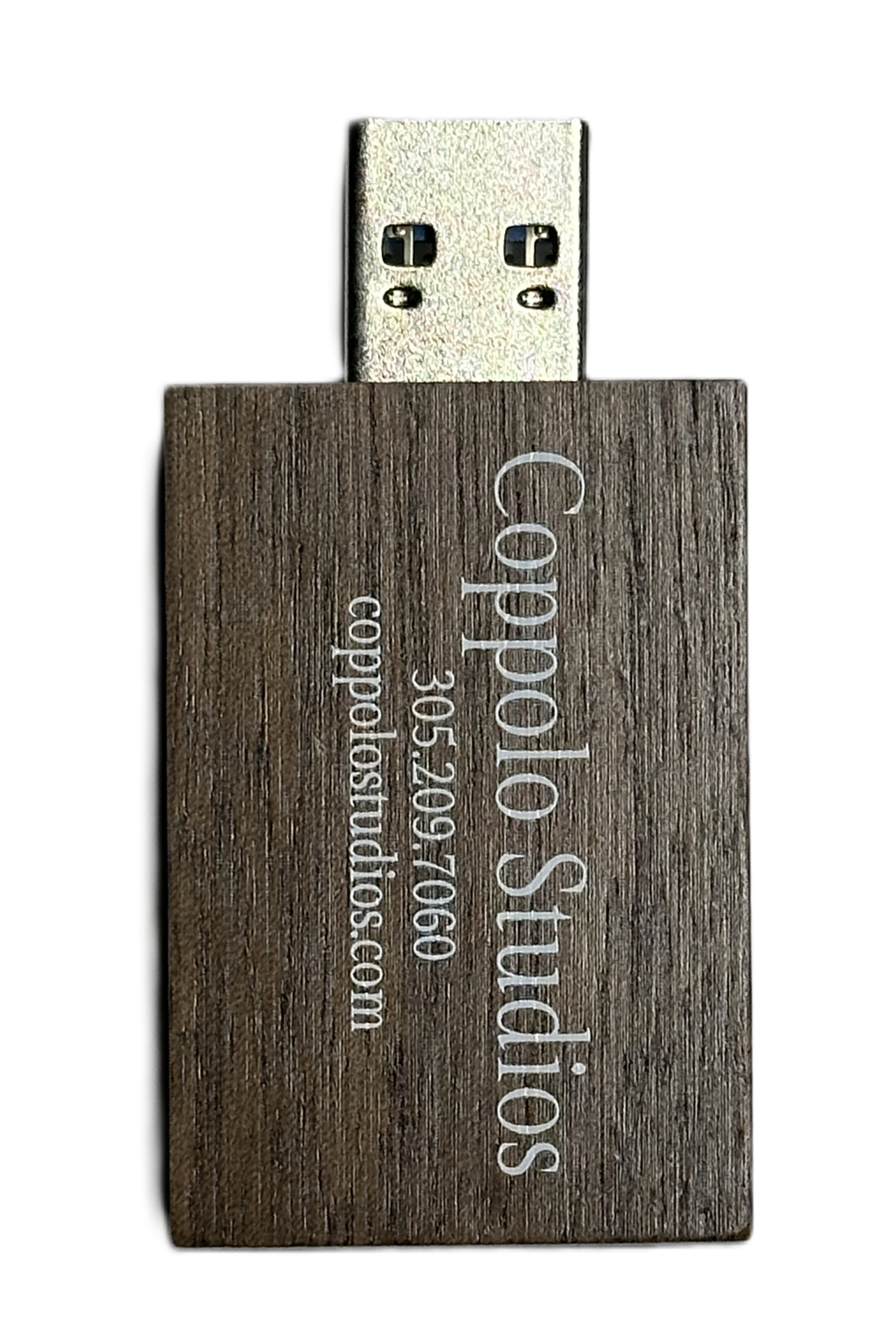 USB flash drive with wood grain texture and white printed text.