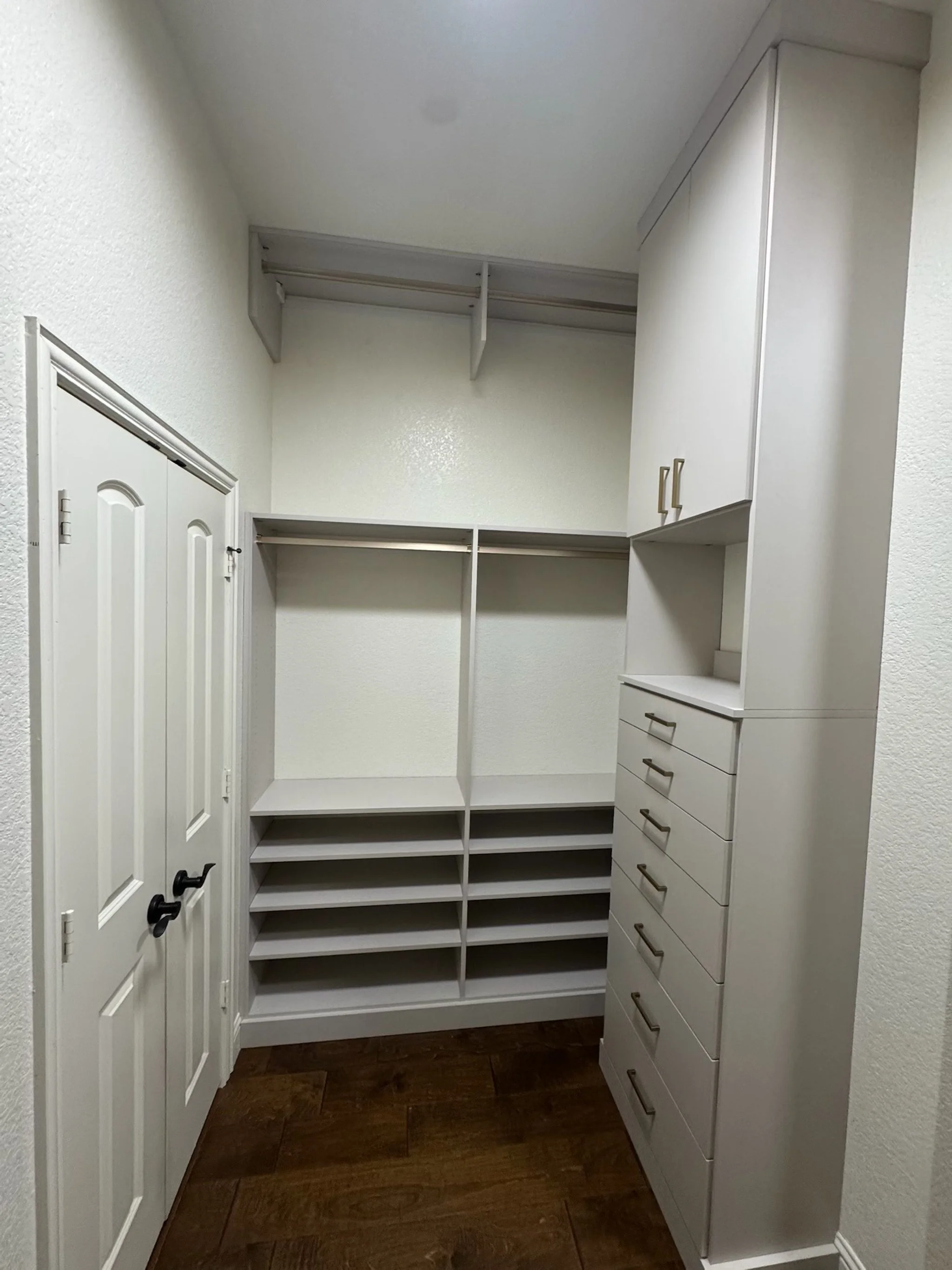 Custom Closet in White Finish with Drawers and Shelving