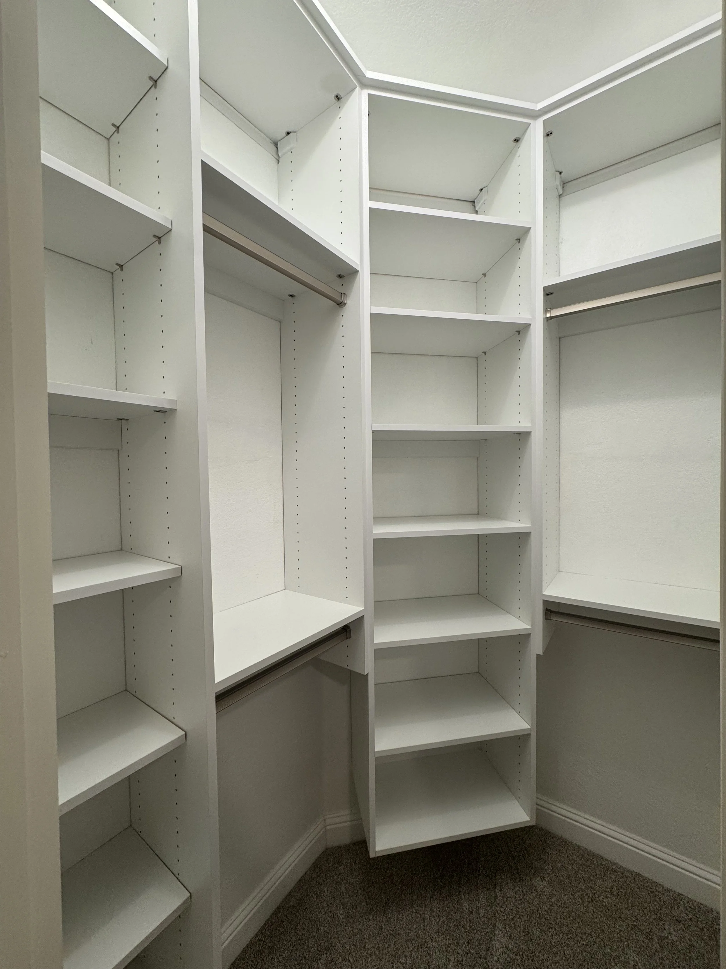 Custom White Closet with Angled Walls