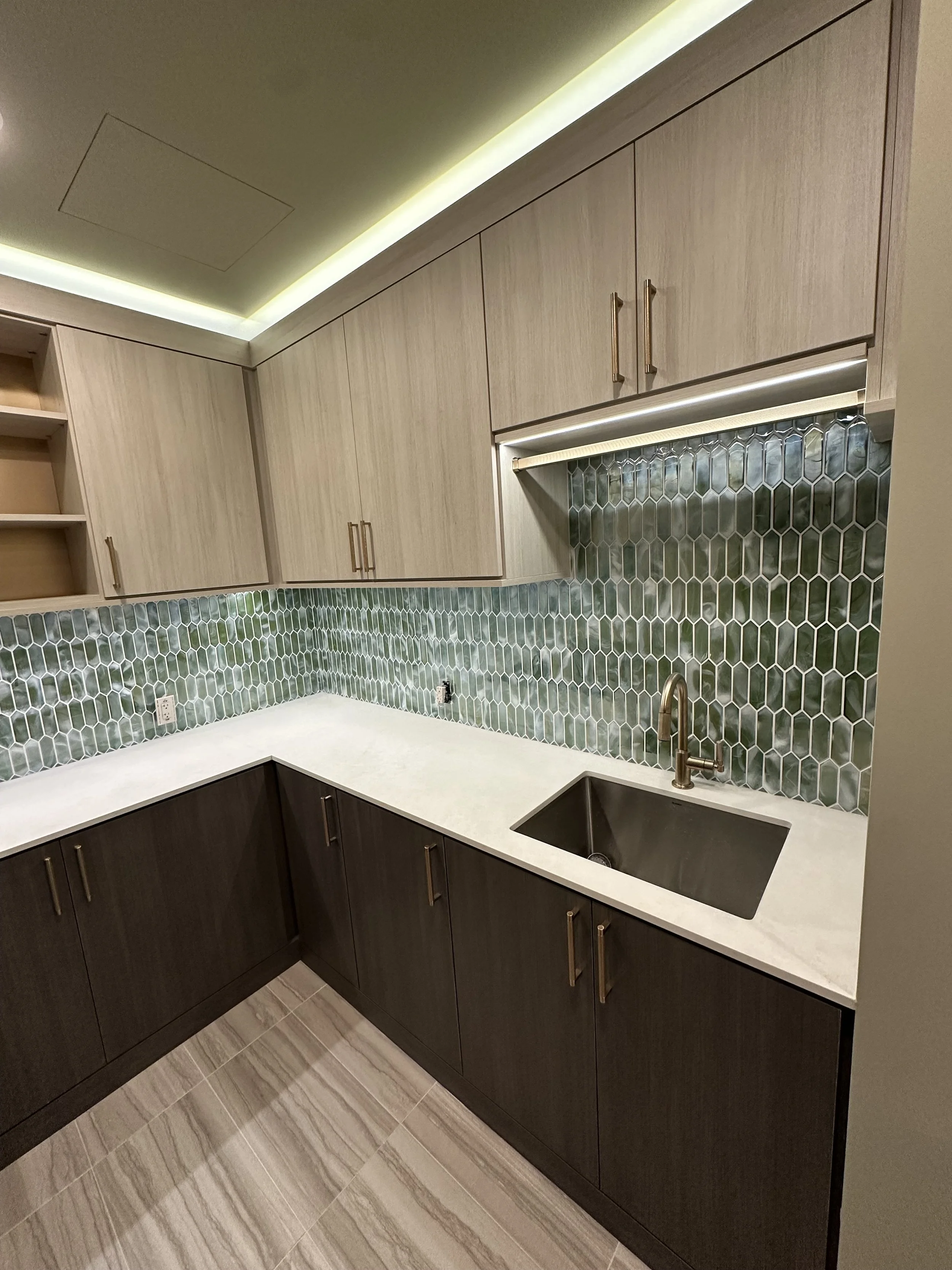 Custom Laundry Room with Cabinets and Shelving