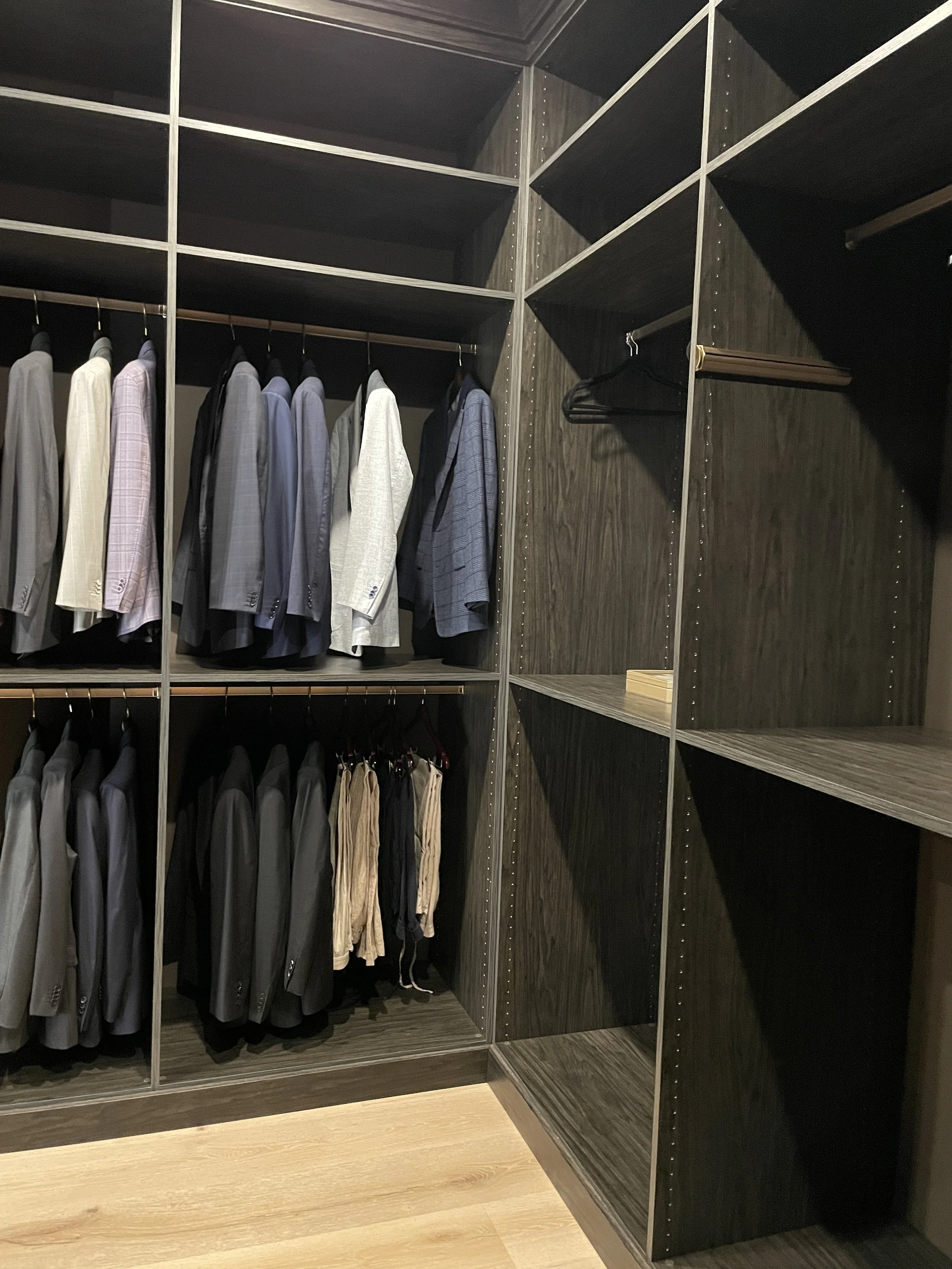 Custom Dark Grey Closet with Gold accessory