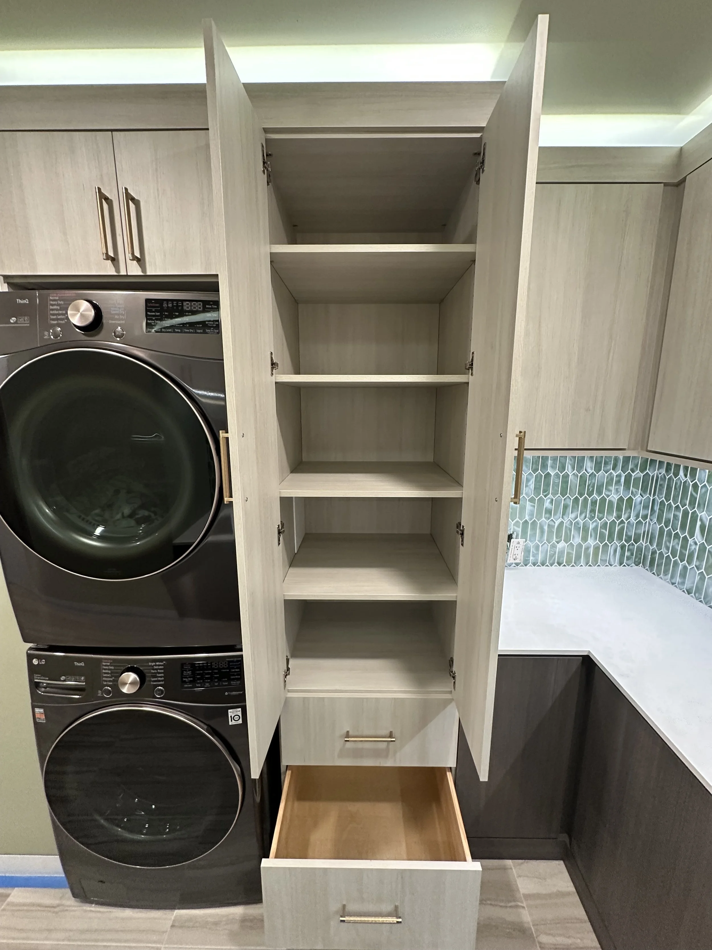 Custom Laundry Room with Linen Shelving
