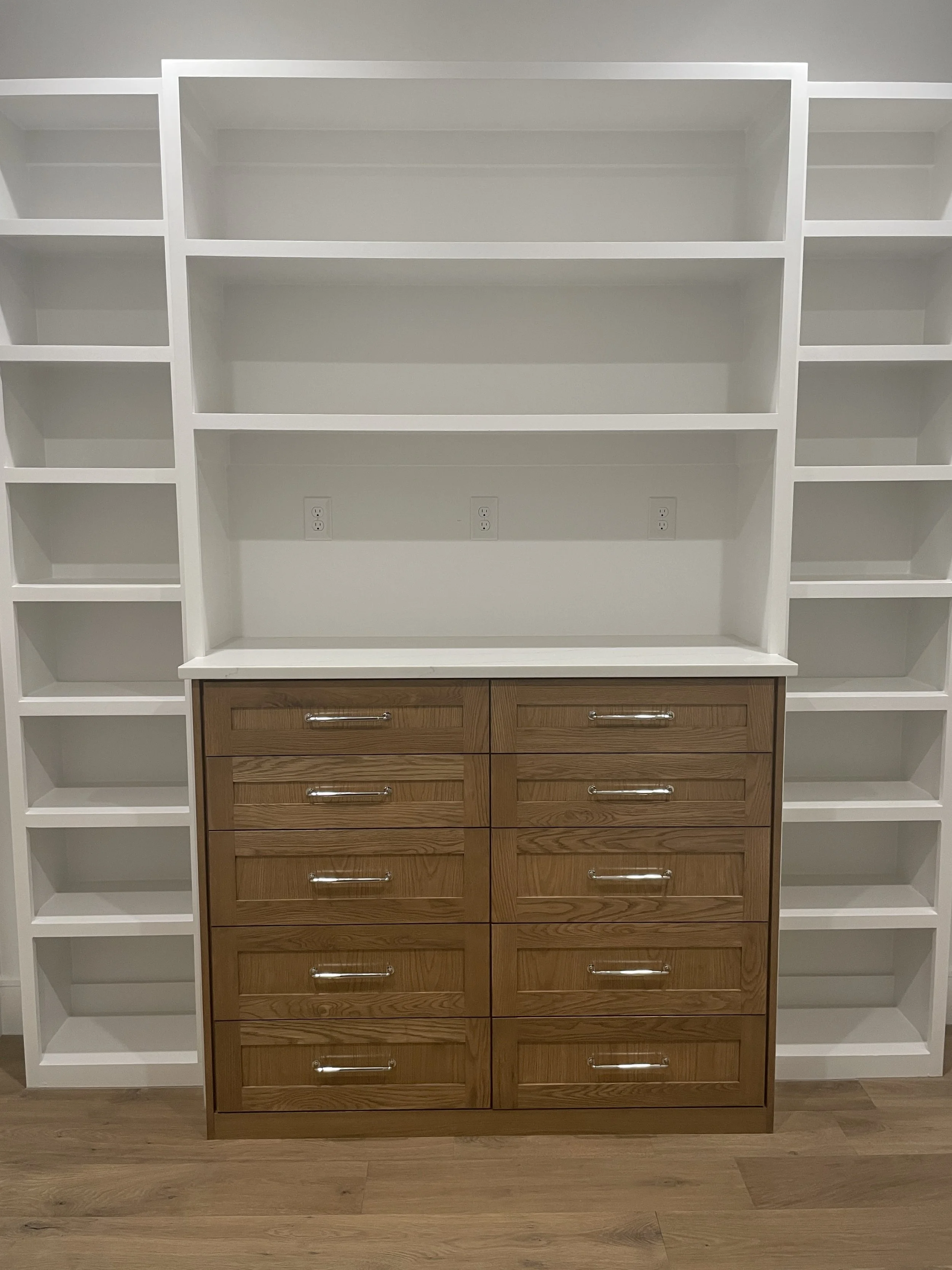 White Closet with Brown Wood Grain Drawers