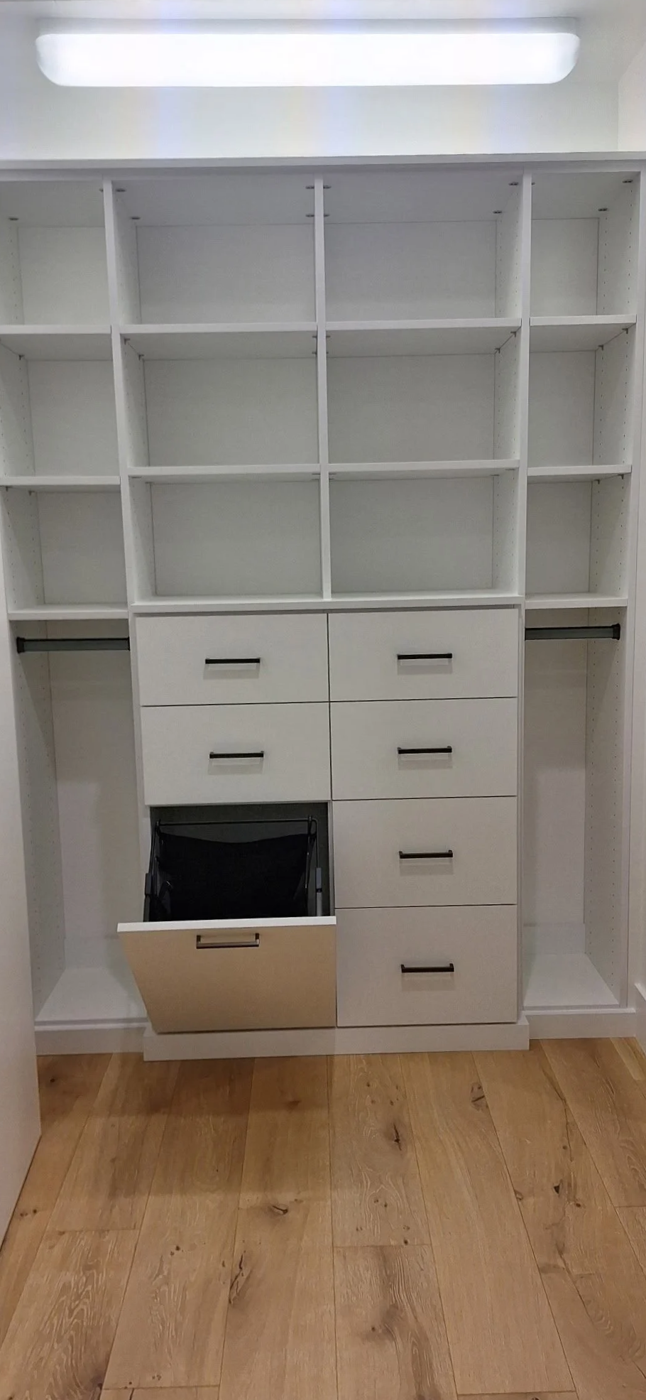 Custom Closet with Hamper Tilt Out Drawer