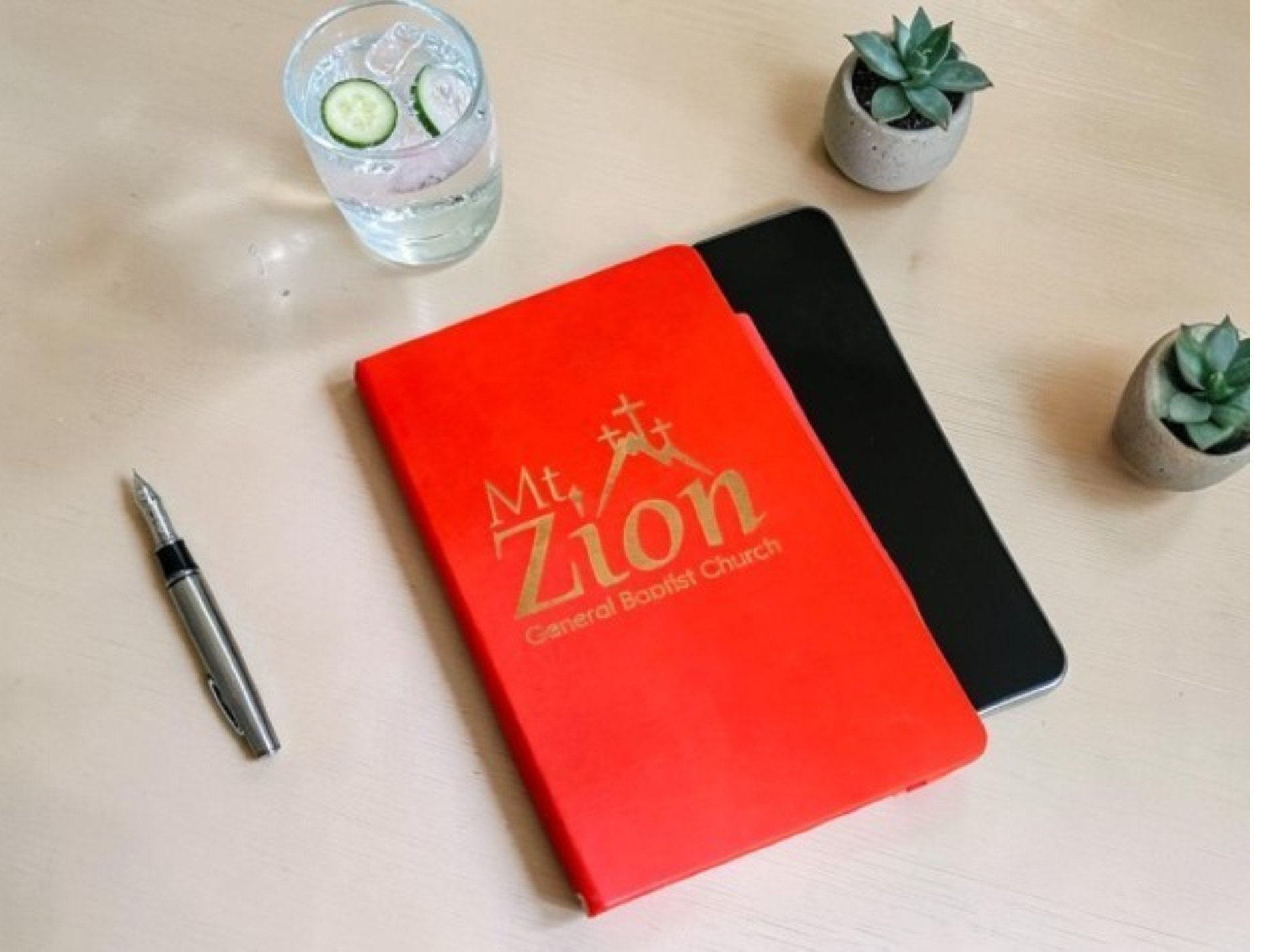 journal leather red mtz with succulents.jpg