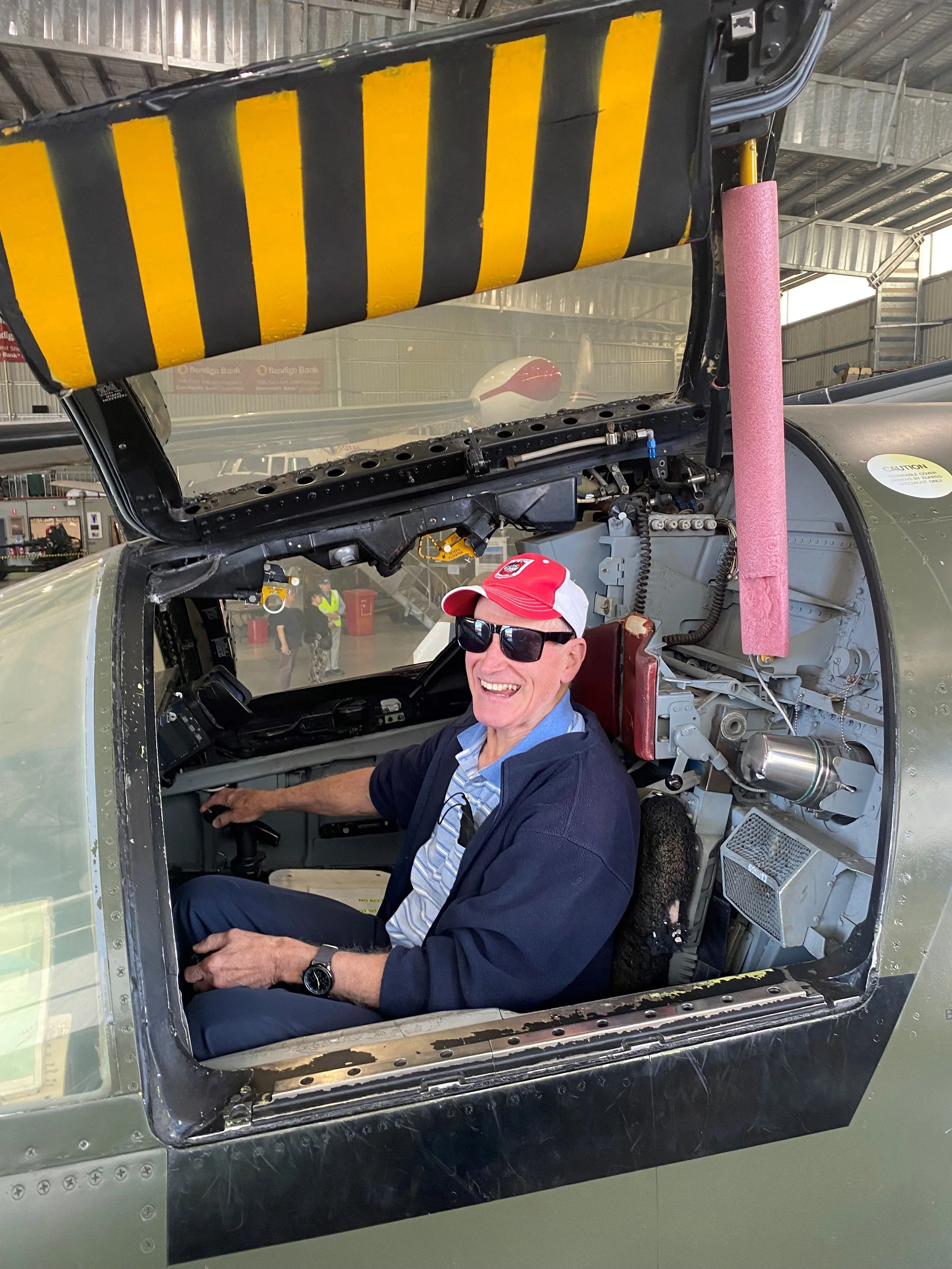 Man in a plane at the HARS Museum