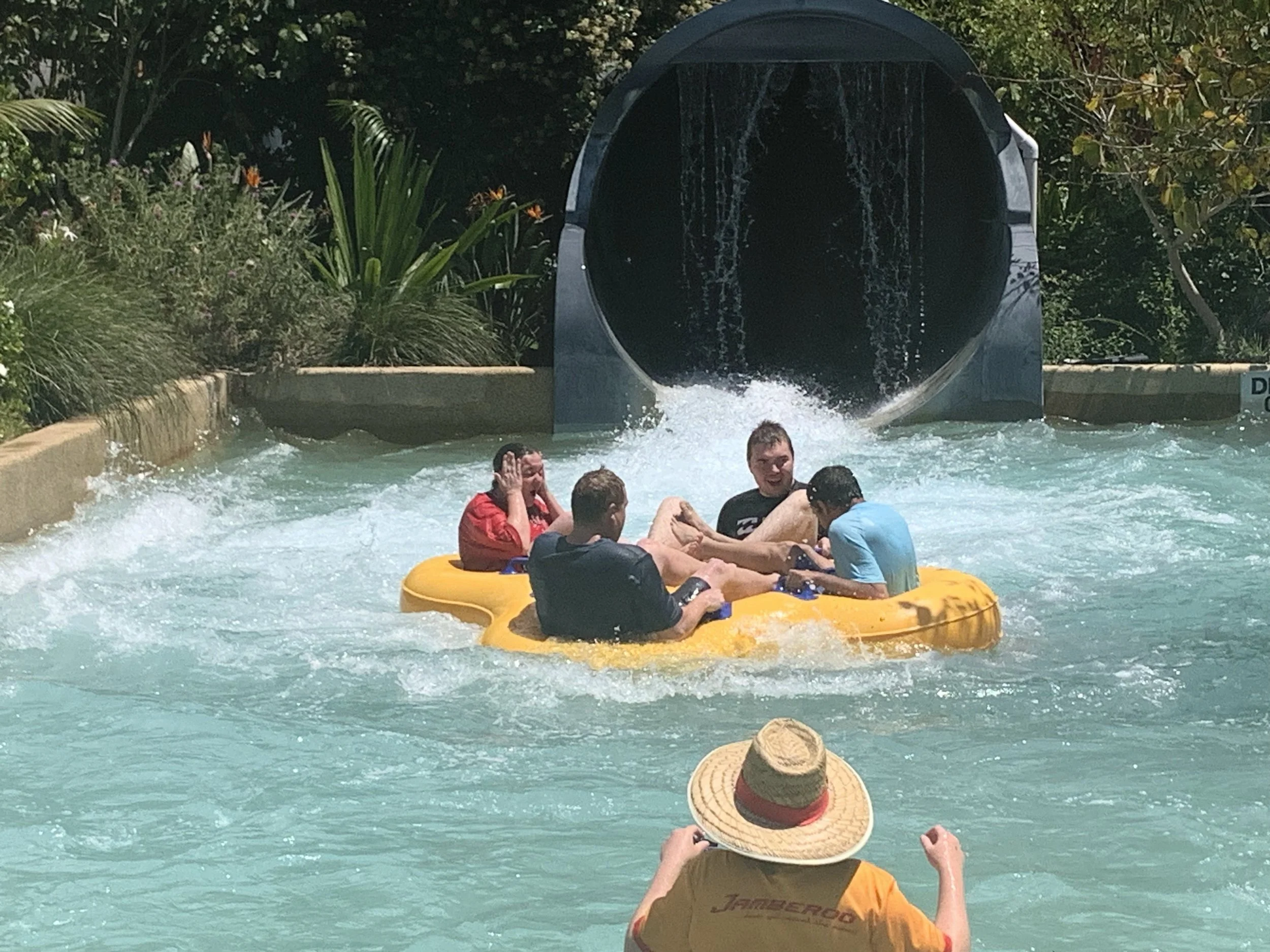 Participants at Jamberoo Action Park in a yellow four person float