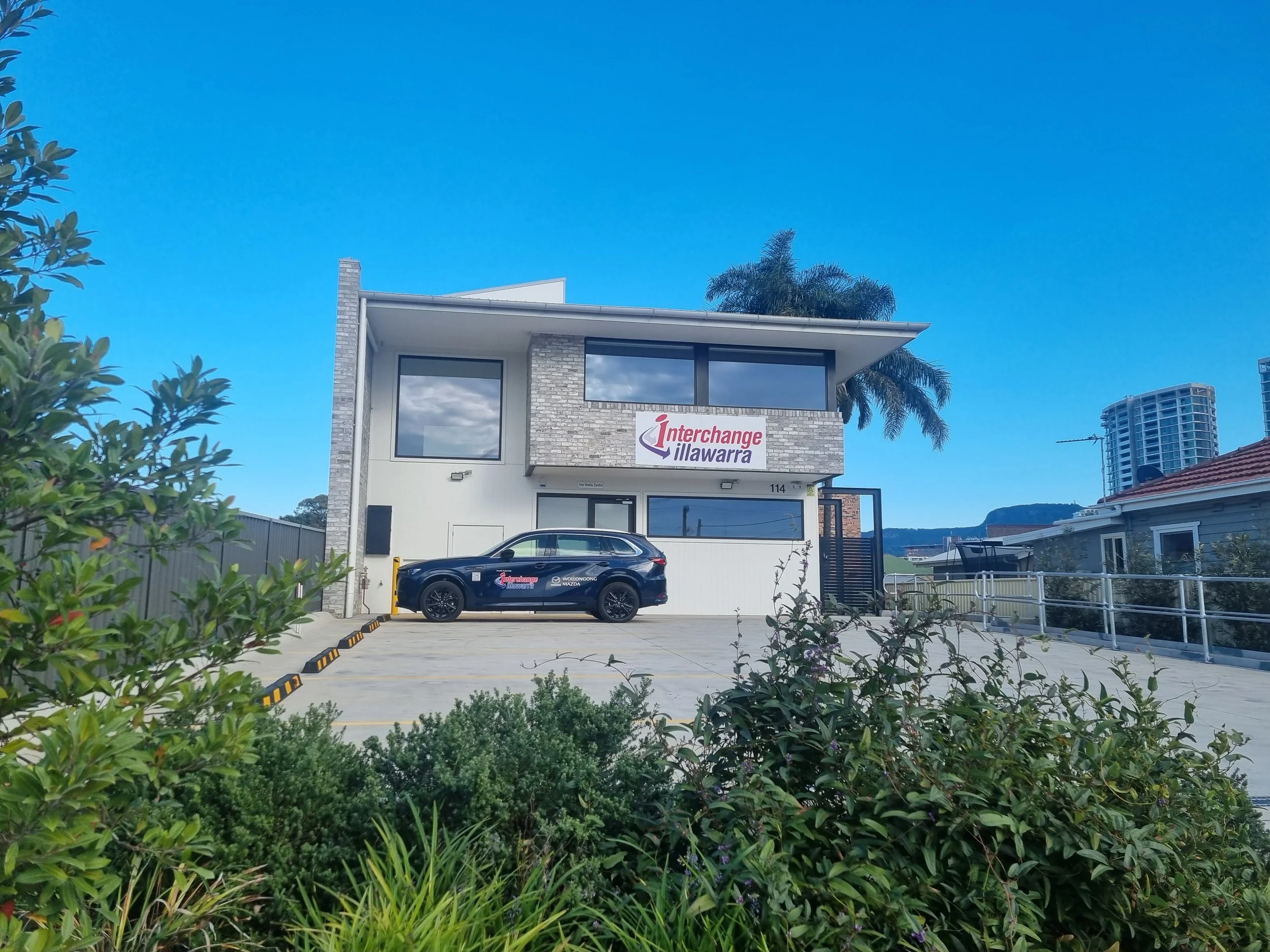 Street view of Interchange Illawarra's head office with the Mazda in carpark