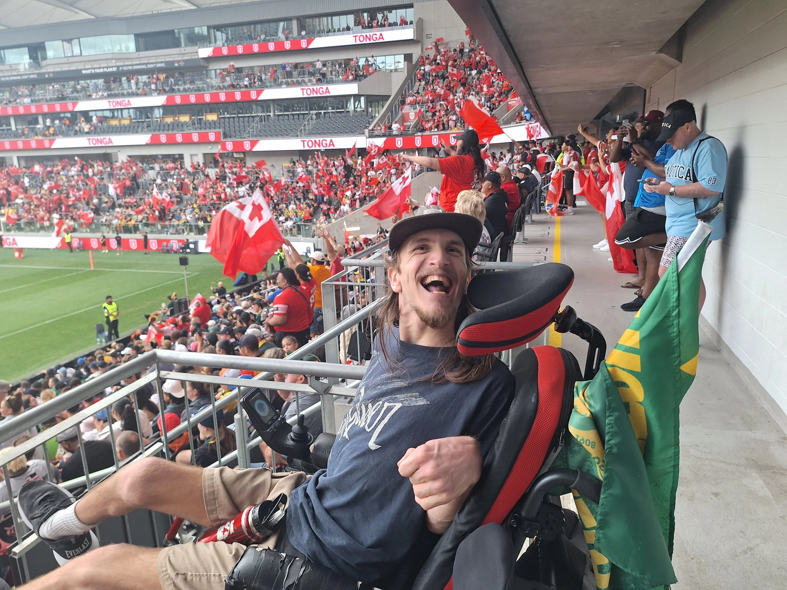 A participant in a wheelchair at a football game