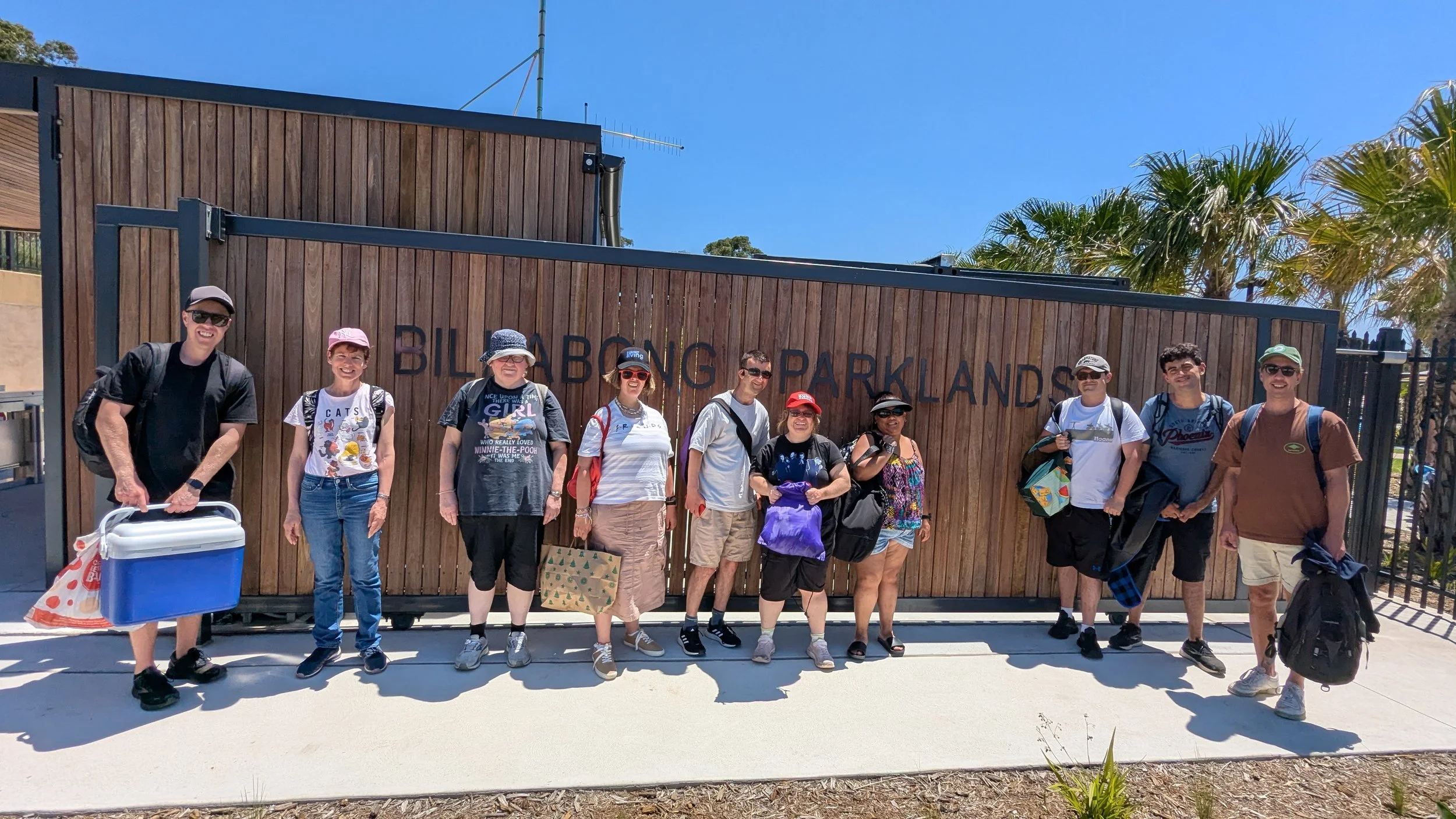 Group of participants at Billabong Parkland sign