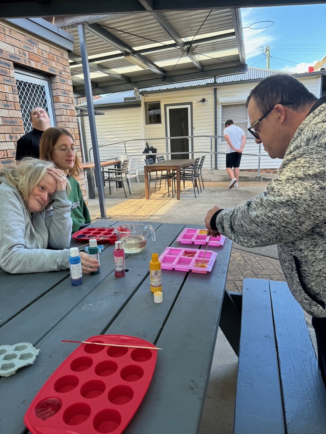 Group of participants at Evans Street making soaps