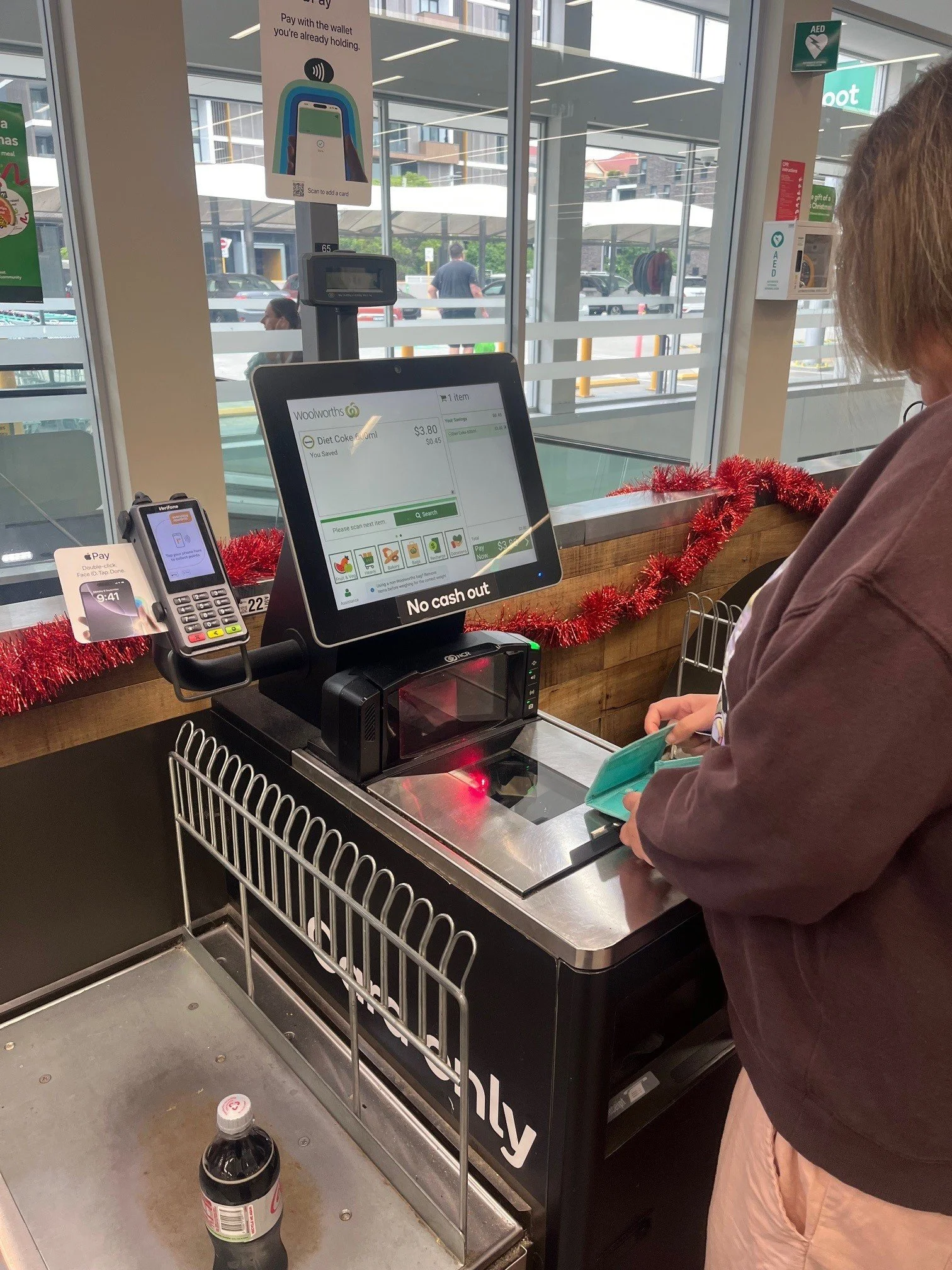 A photo of a checkout at Woolies