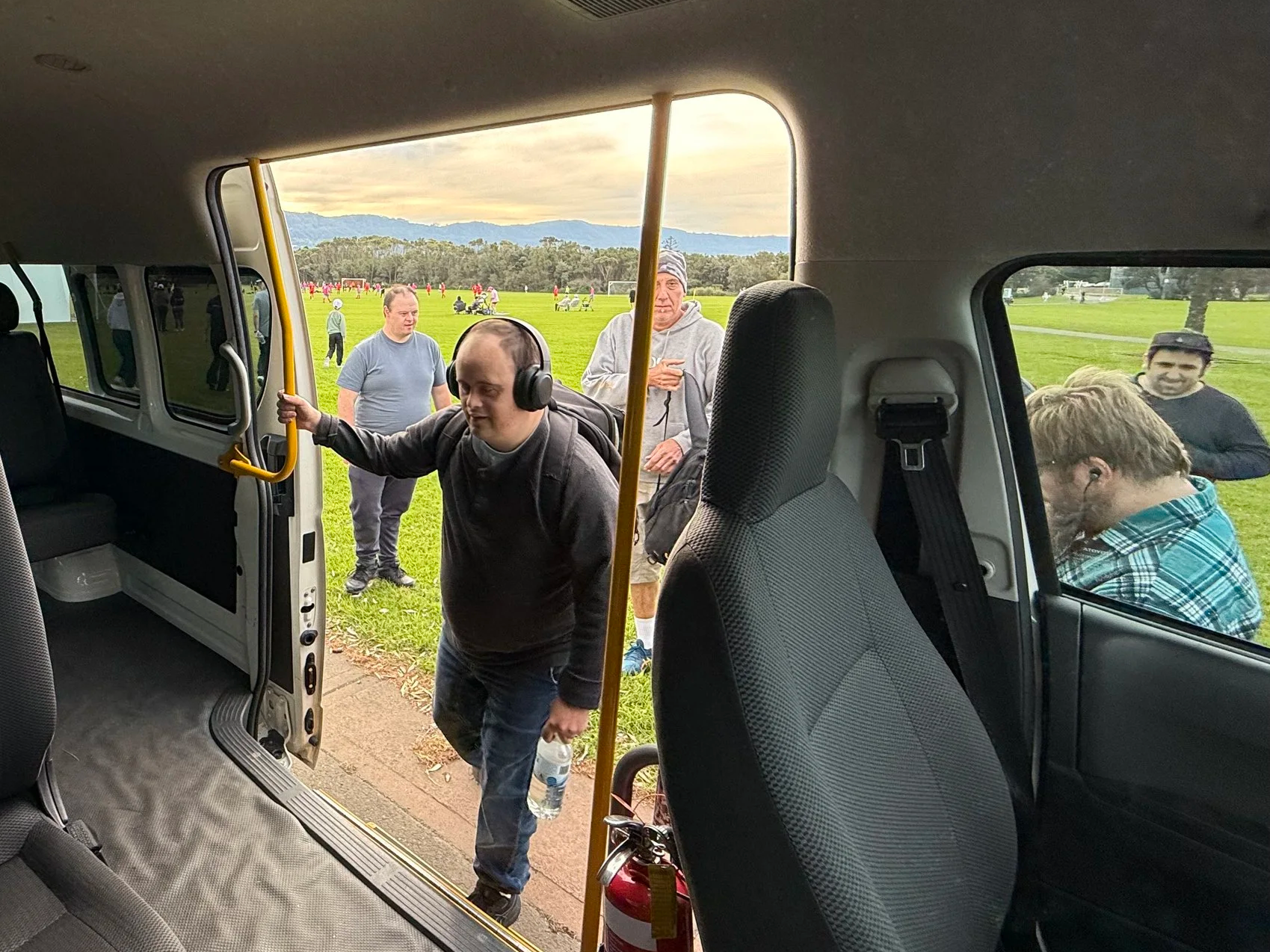 Participants getting onto the mini bus