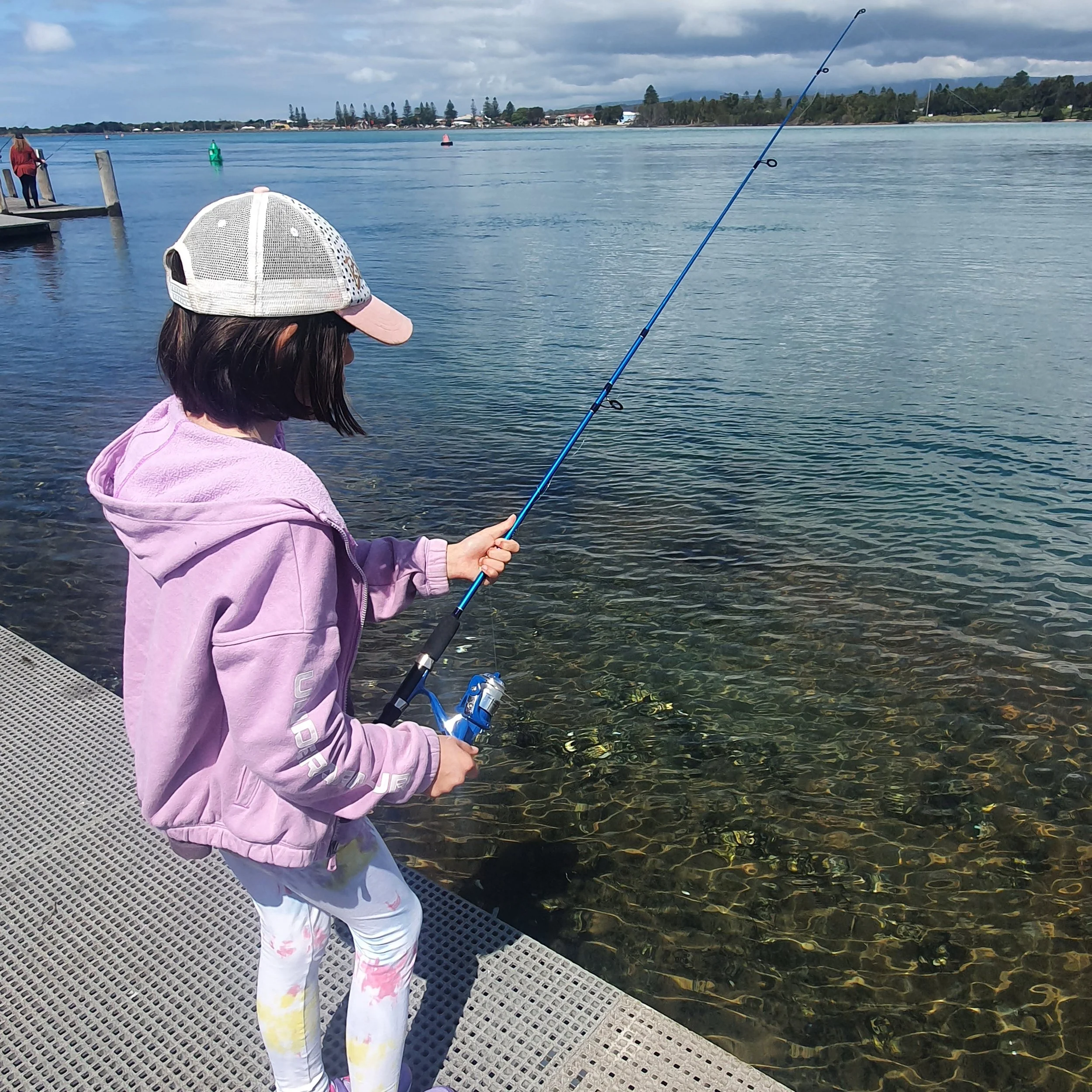 Young girl fishing at Lake Illawarra