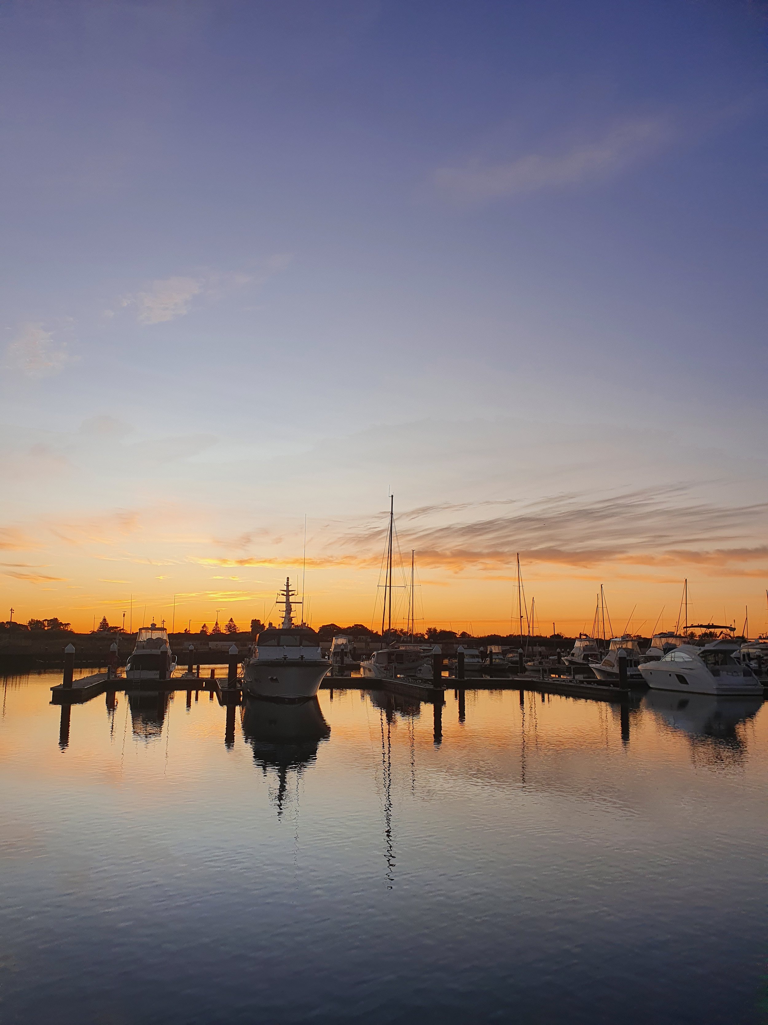 Photo of boats at Shell Cove Marina on sunset