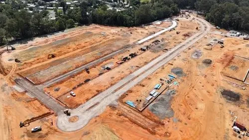 Drone image of road construction, earthworks and civil infrastructure works for a new residential community.