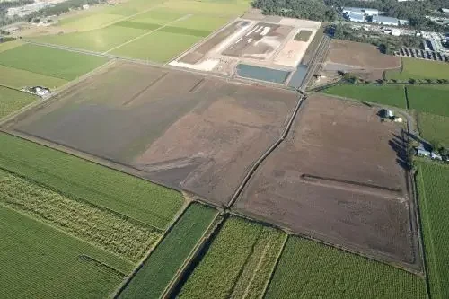 Aerial view of a rural construction site.